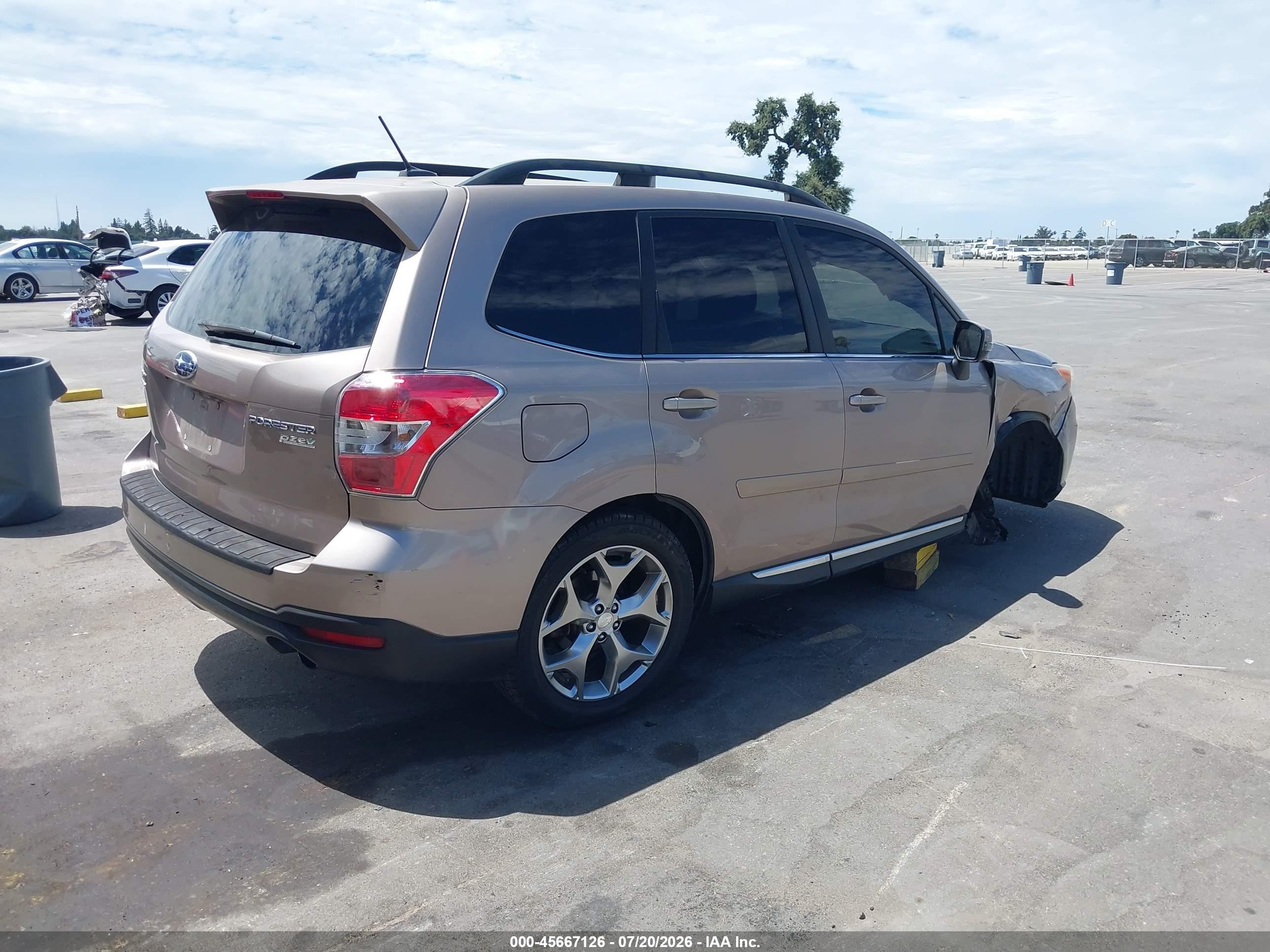 2015 Subaru Forester 2.5i Touring Tan vin: JF2SJAUC4FH569686