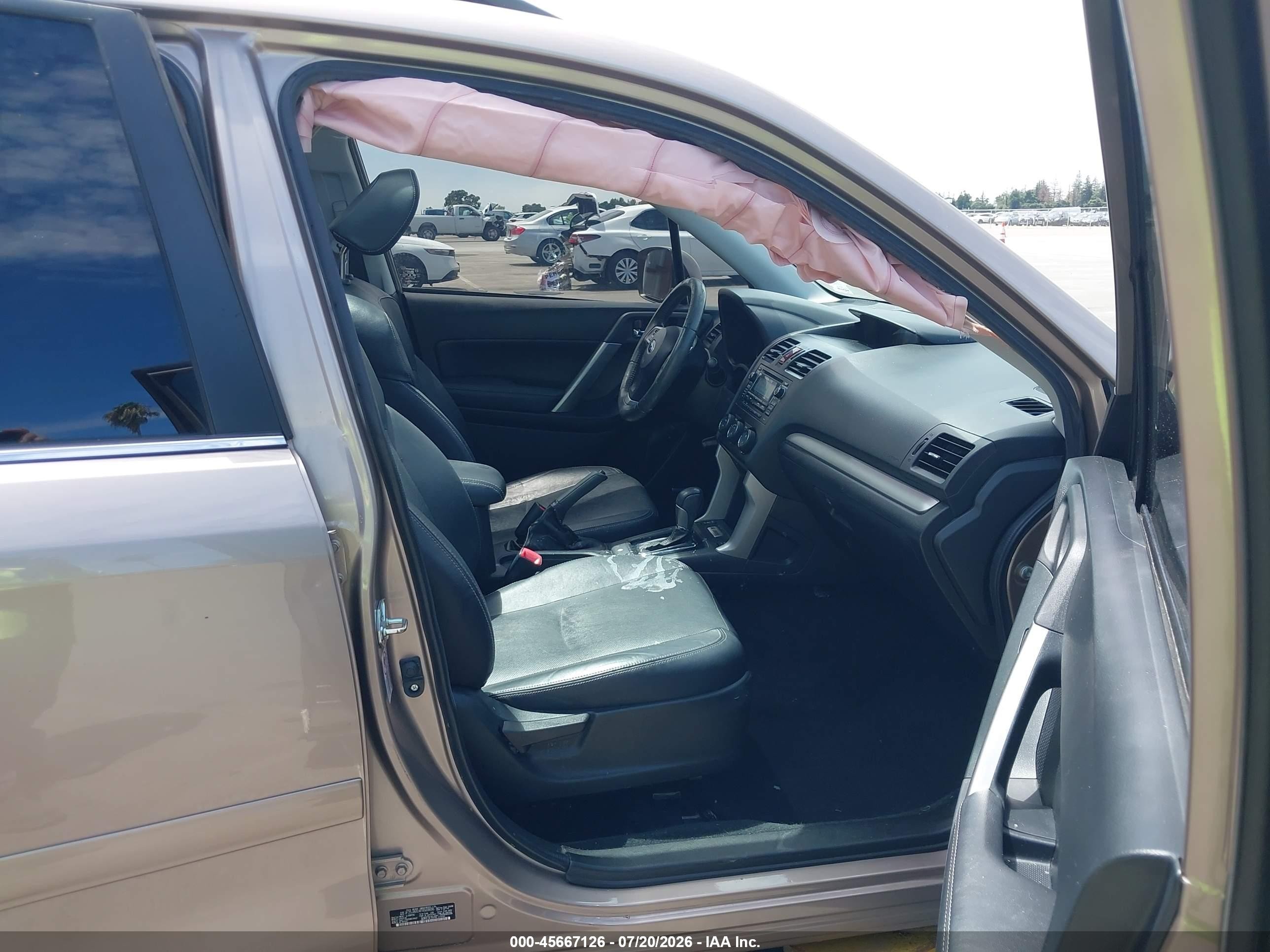 2015 Subaru Forester 2.5i Touring Tan vin: JF2SJAUC4FH569686