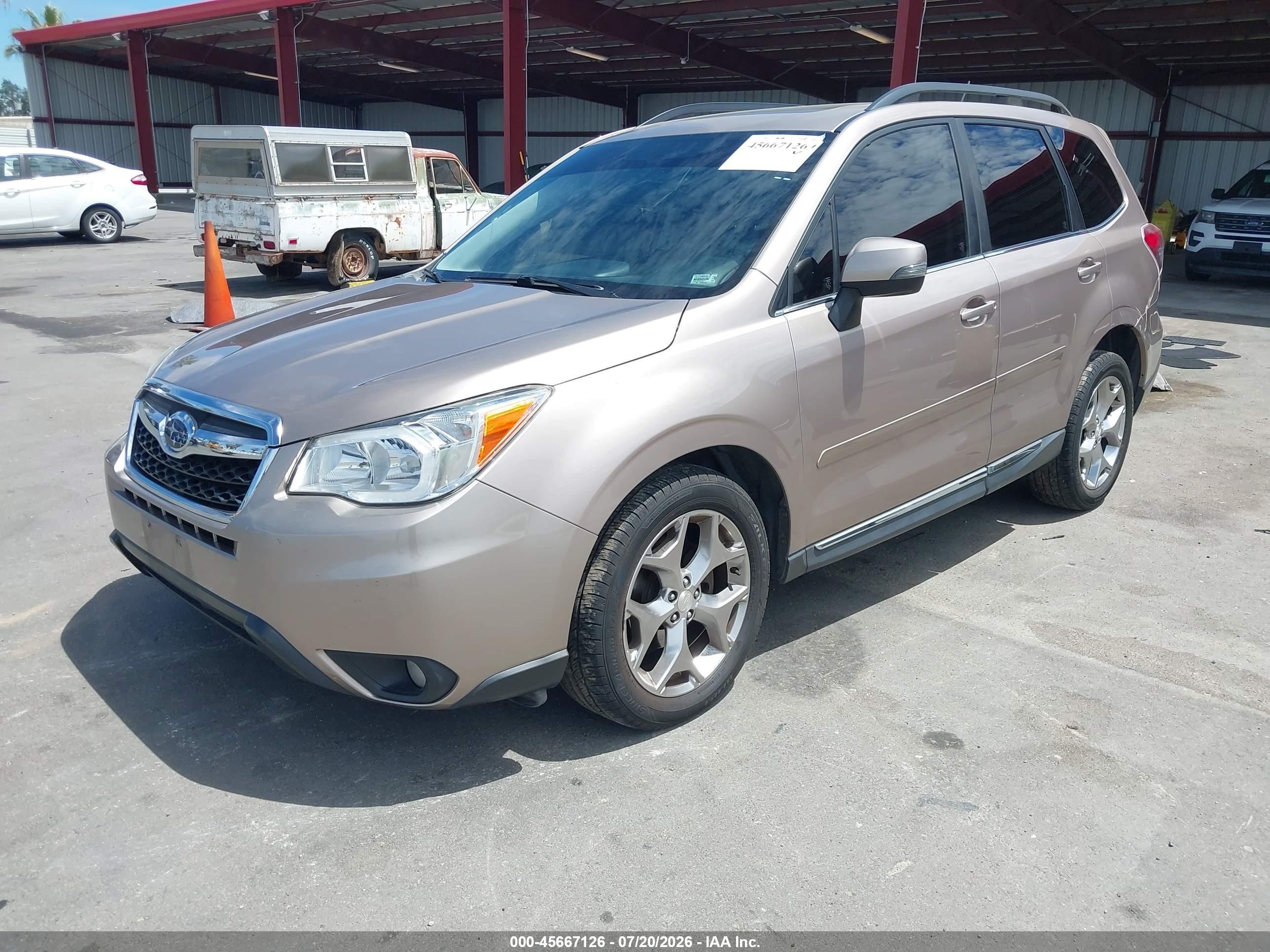 2015 Subaru Forester 2.5i Touring Tan vin: JF2SJAUC4FH569686