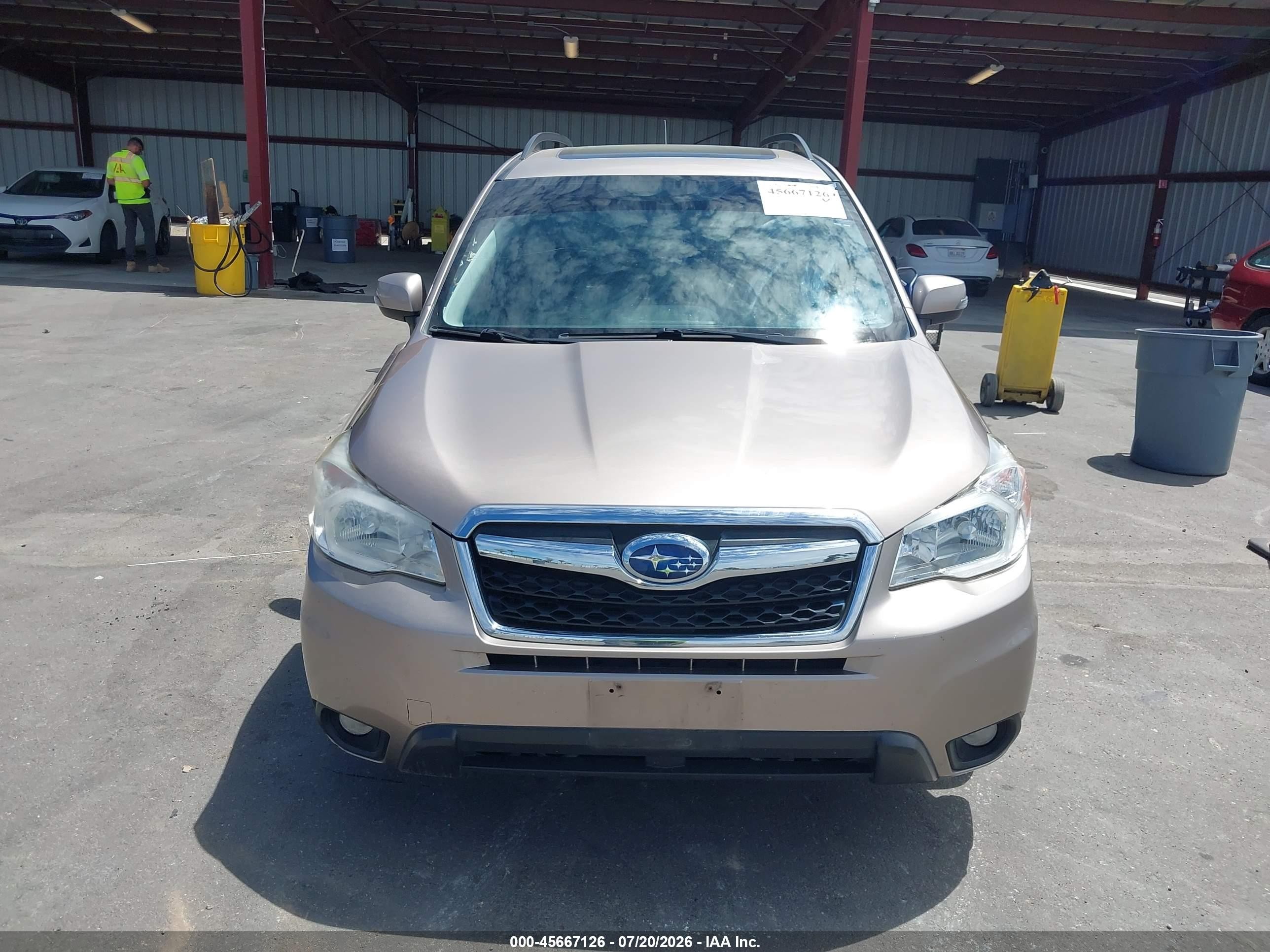 2015 Subaru Forester 2.5i Touring Tan vin: JF2SJAUC4FH569686