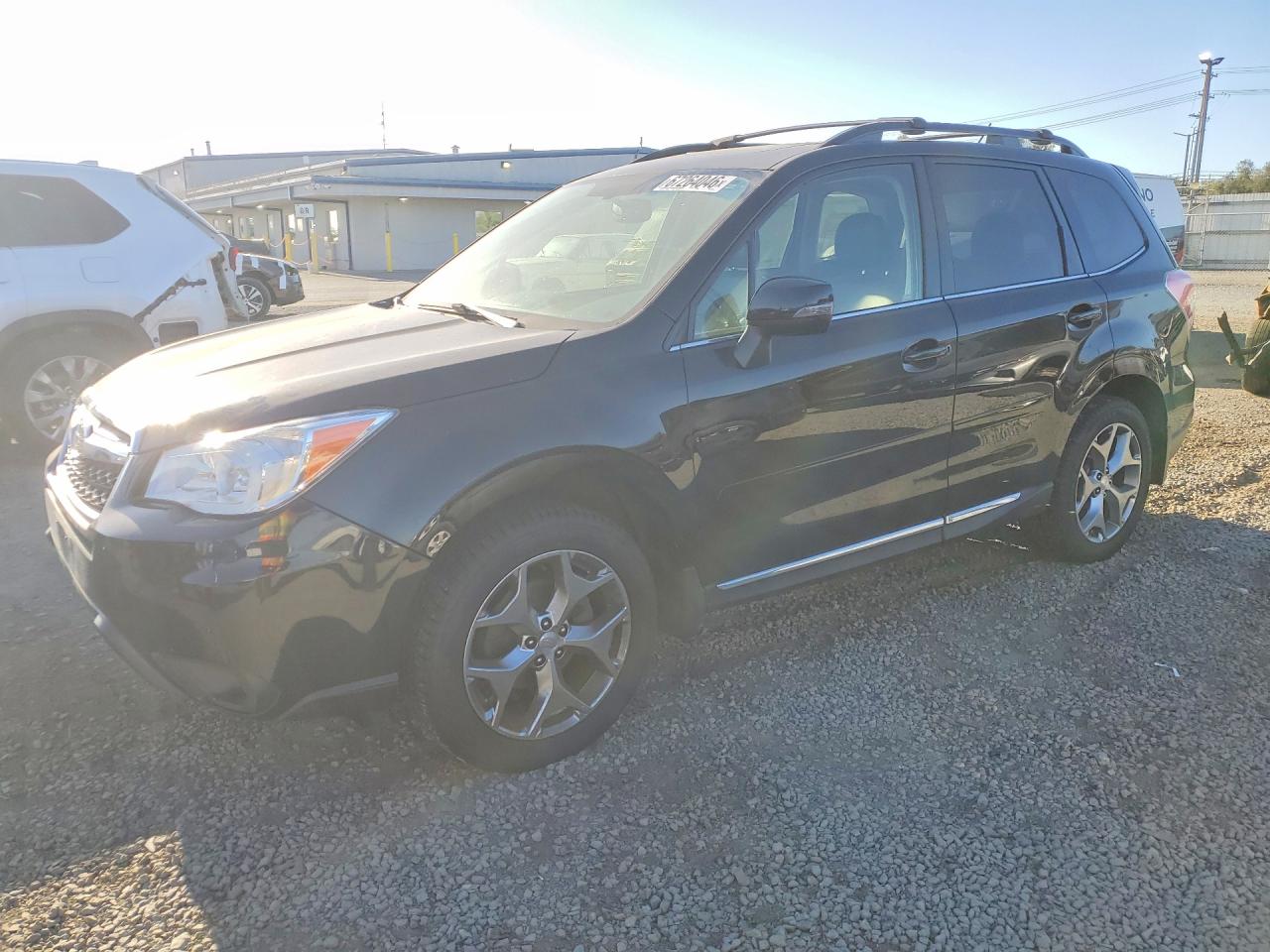 2015 Subaru Forester 2.5i Touring Black vin: JF2SJAUC8FH576673