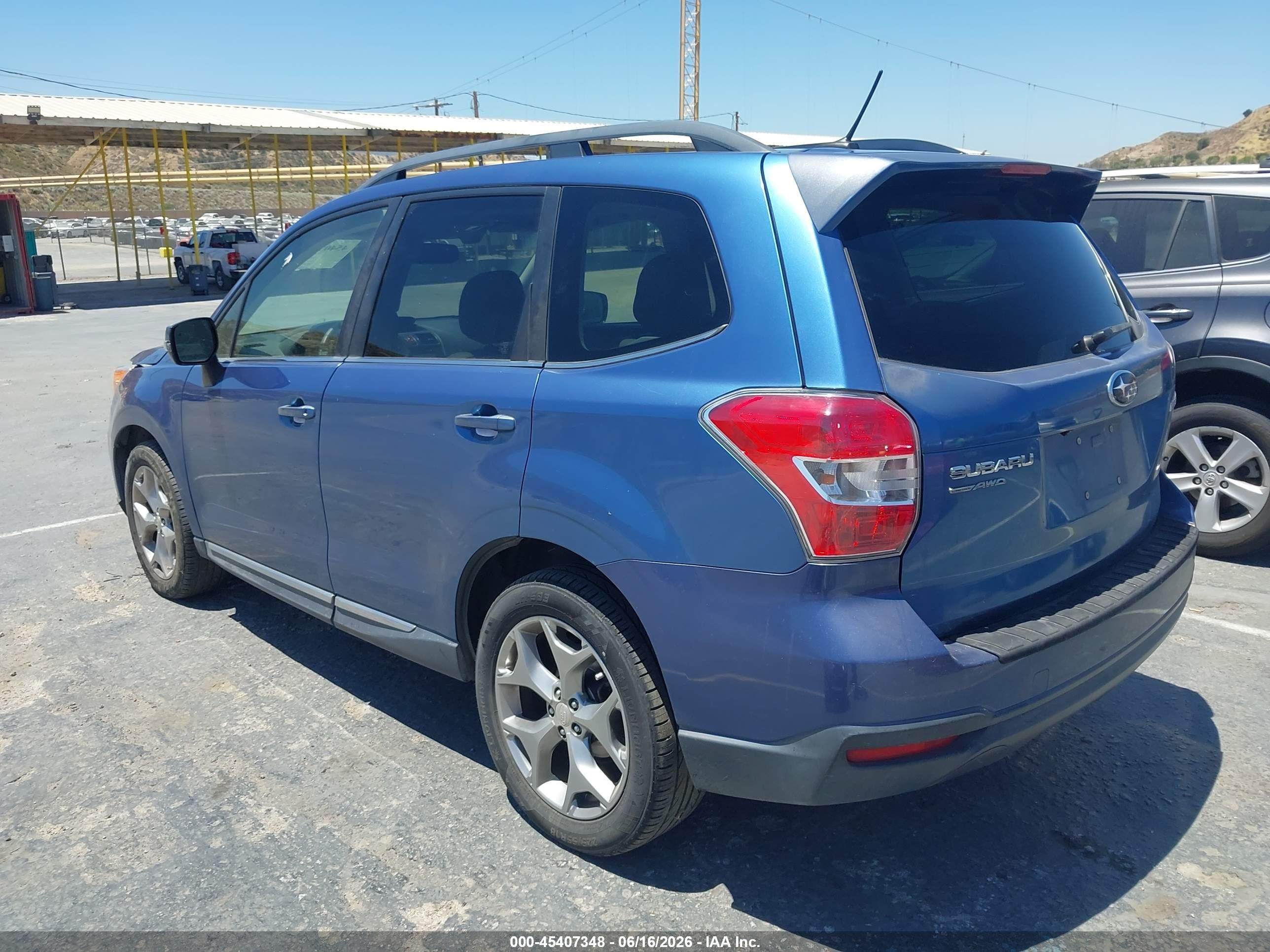 2015 Subaru Forester 2.5i Touring Blue vin: JF2SJAWC1FH548615