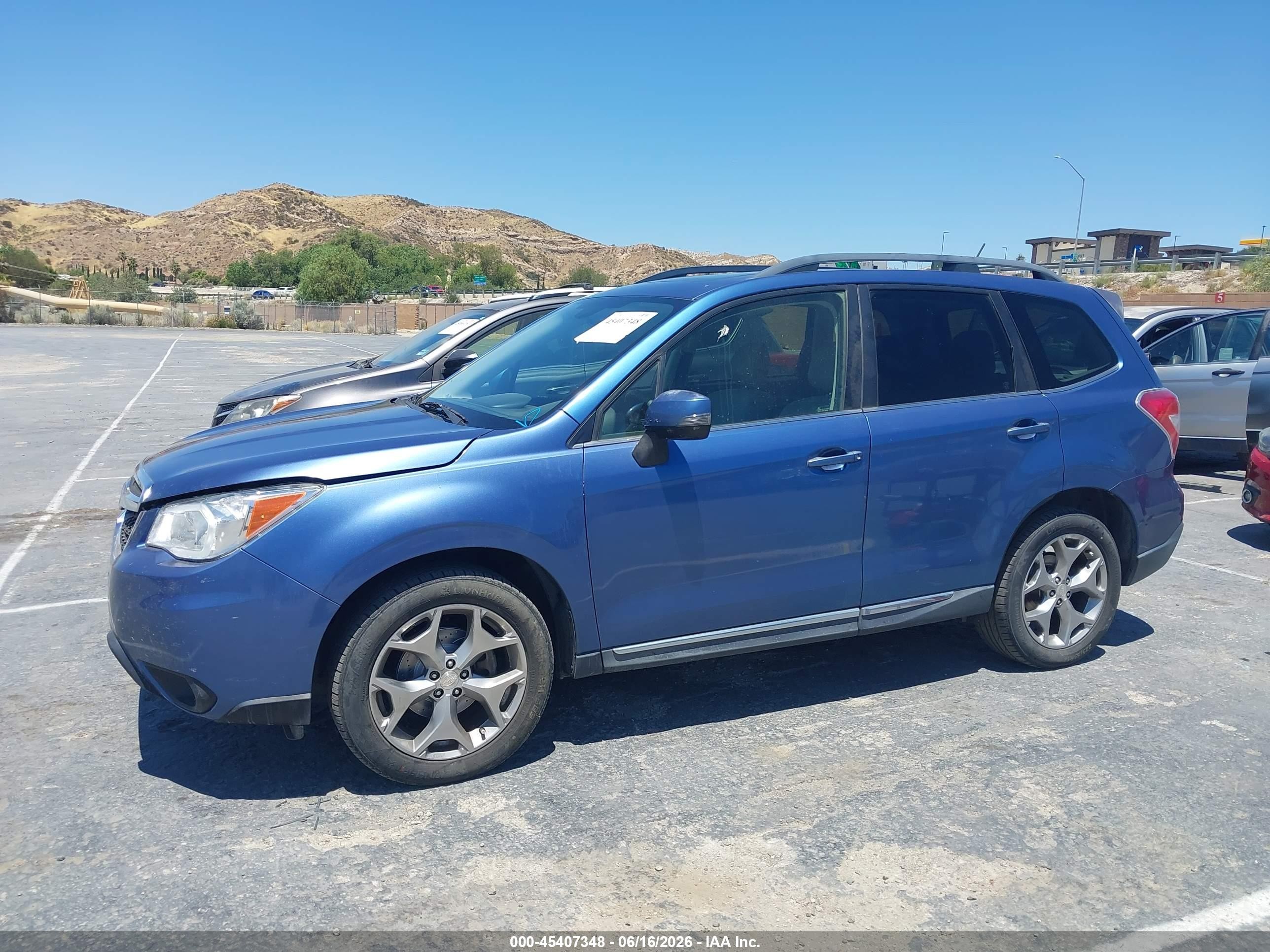 2015 Subaru Forester 2.5i Touring Blue vin: JF2SJAWC1FH548615