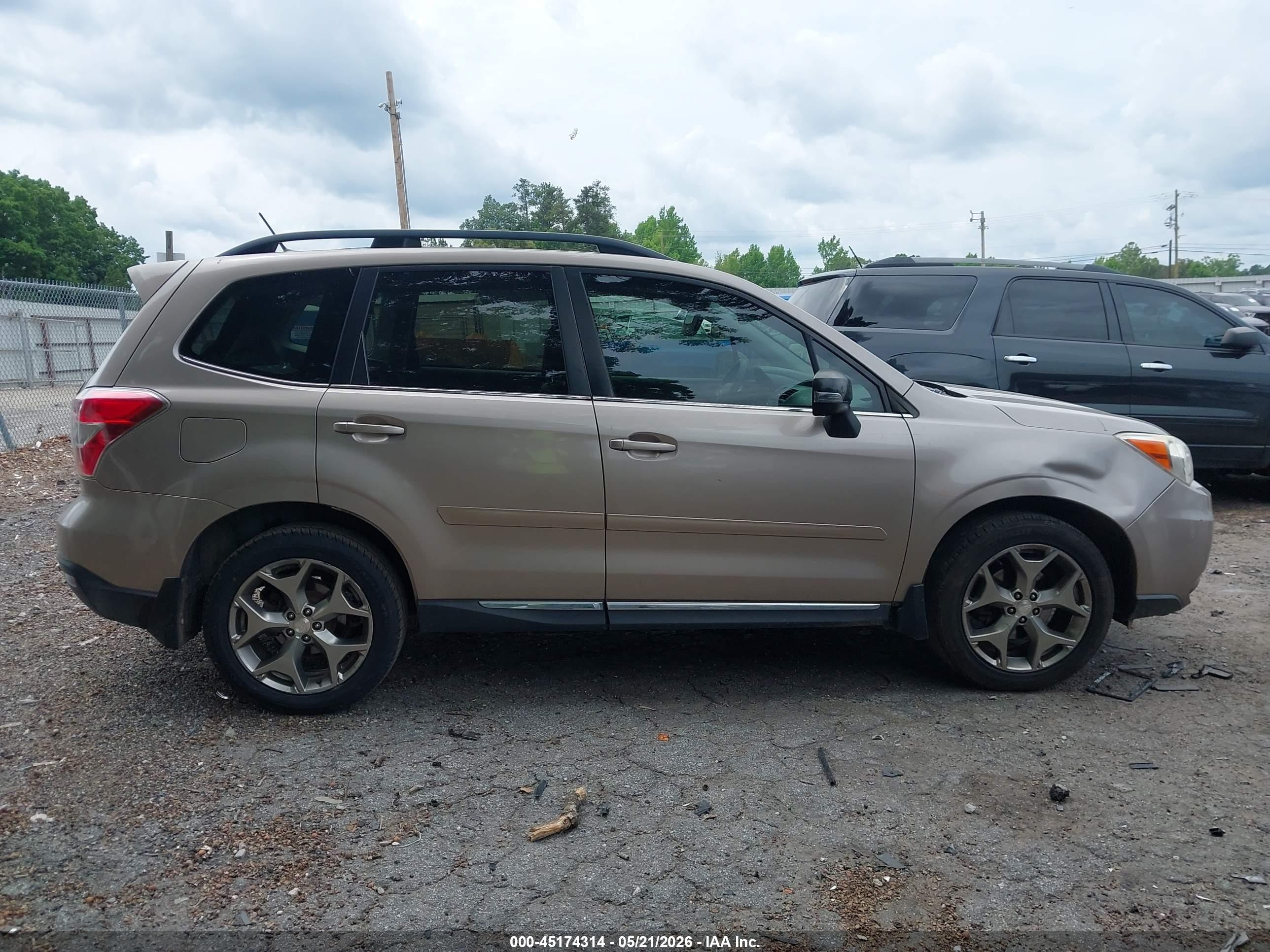 2015 Subaru Forester 2.5i Touring Champagne vin: JF2SJAWC2FH574723