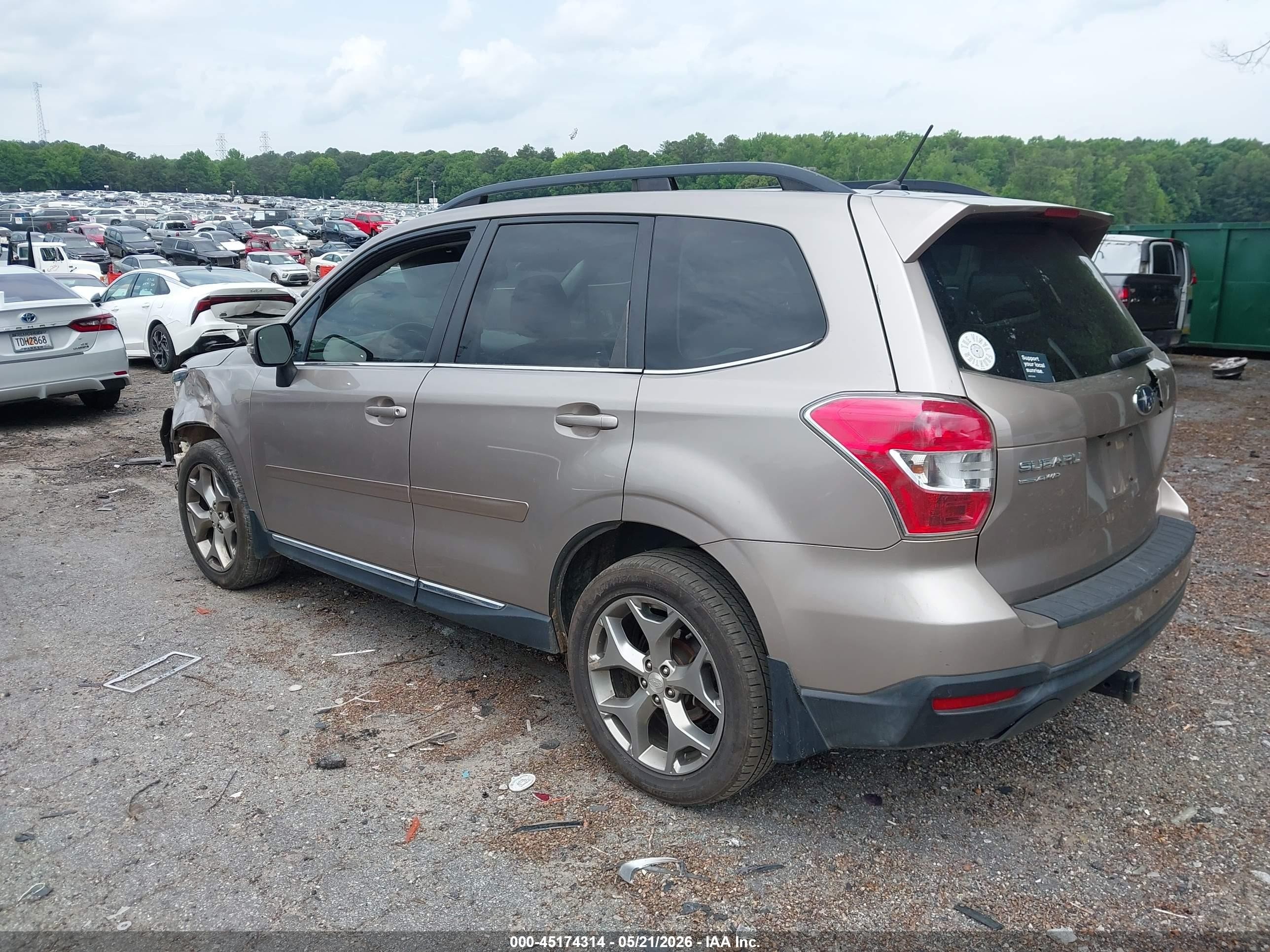2015 Subaru Forester 2.5i Touring Champagne vin: JF2SJAWC2FH574723