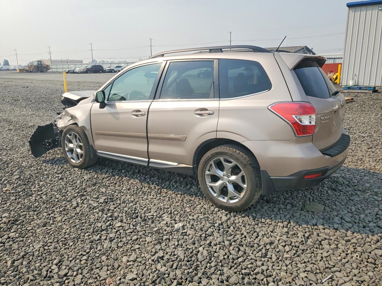 2015 Subaru Forester 2.5i Touring Tan vin: JF2SJAWC5FH585117