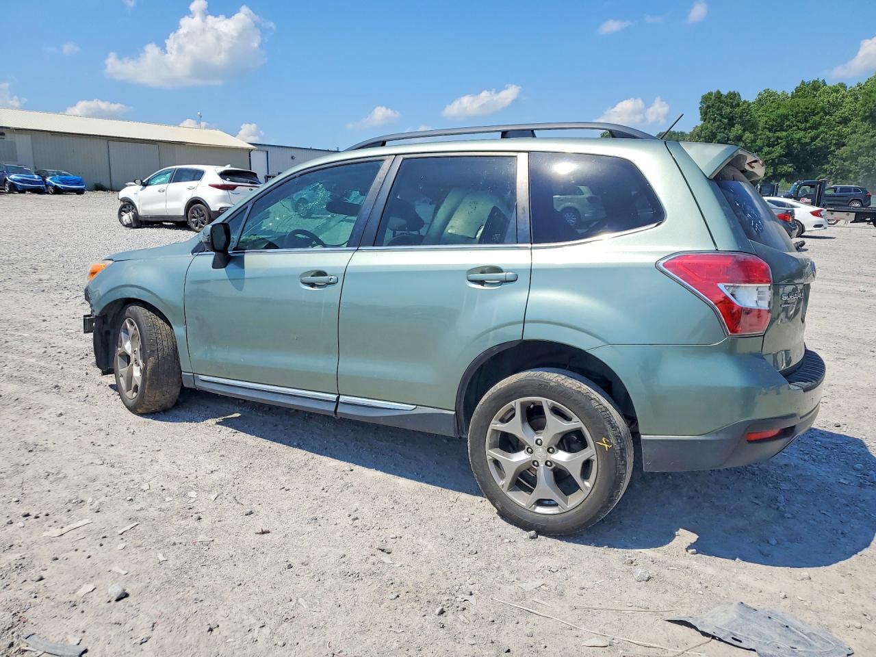 2015 Subaru Forester 2.5i Touring Green vin: JF2SJAWC7FH802246