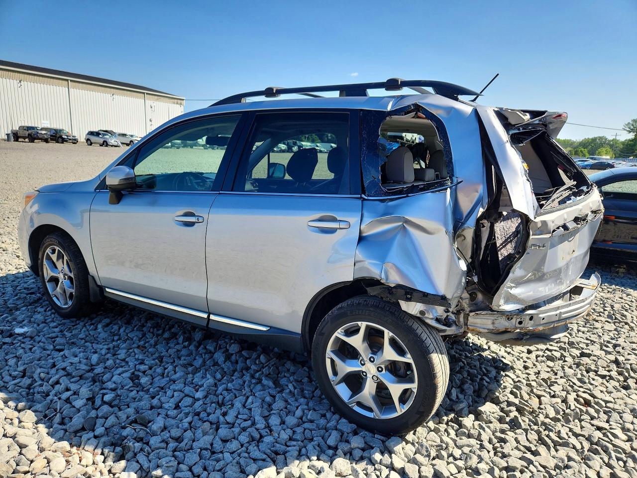 2015 Subaru Forester 2.5i Touring Silver vin: JF2SJAWCXFH499706