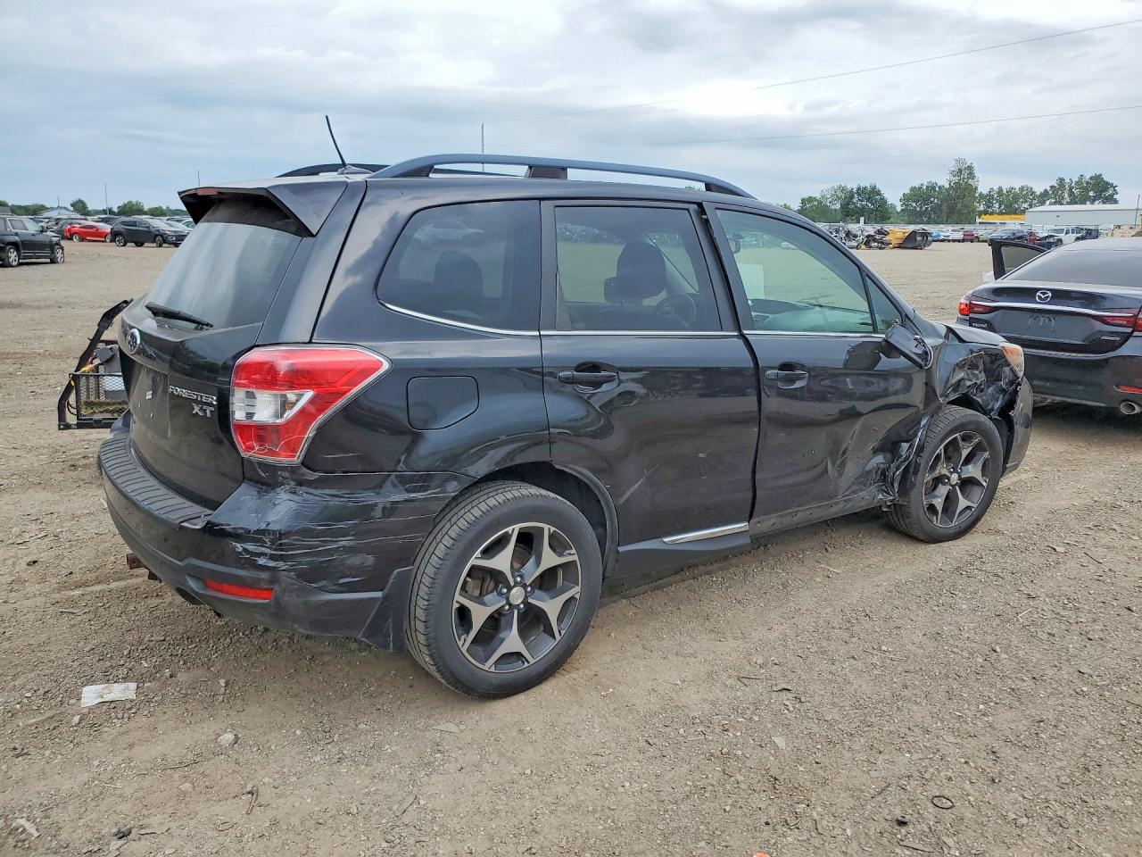 2015 Subaru Forester 2.0xt Touring Black vin: JF2SJGUC7FH421602