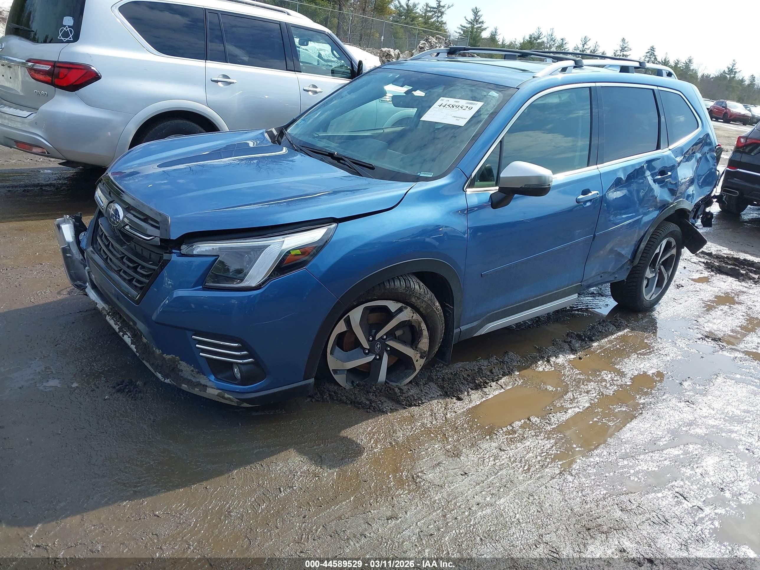 2022 Subaru Forester Touring Blue vin: JF2SKARC9NH432330