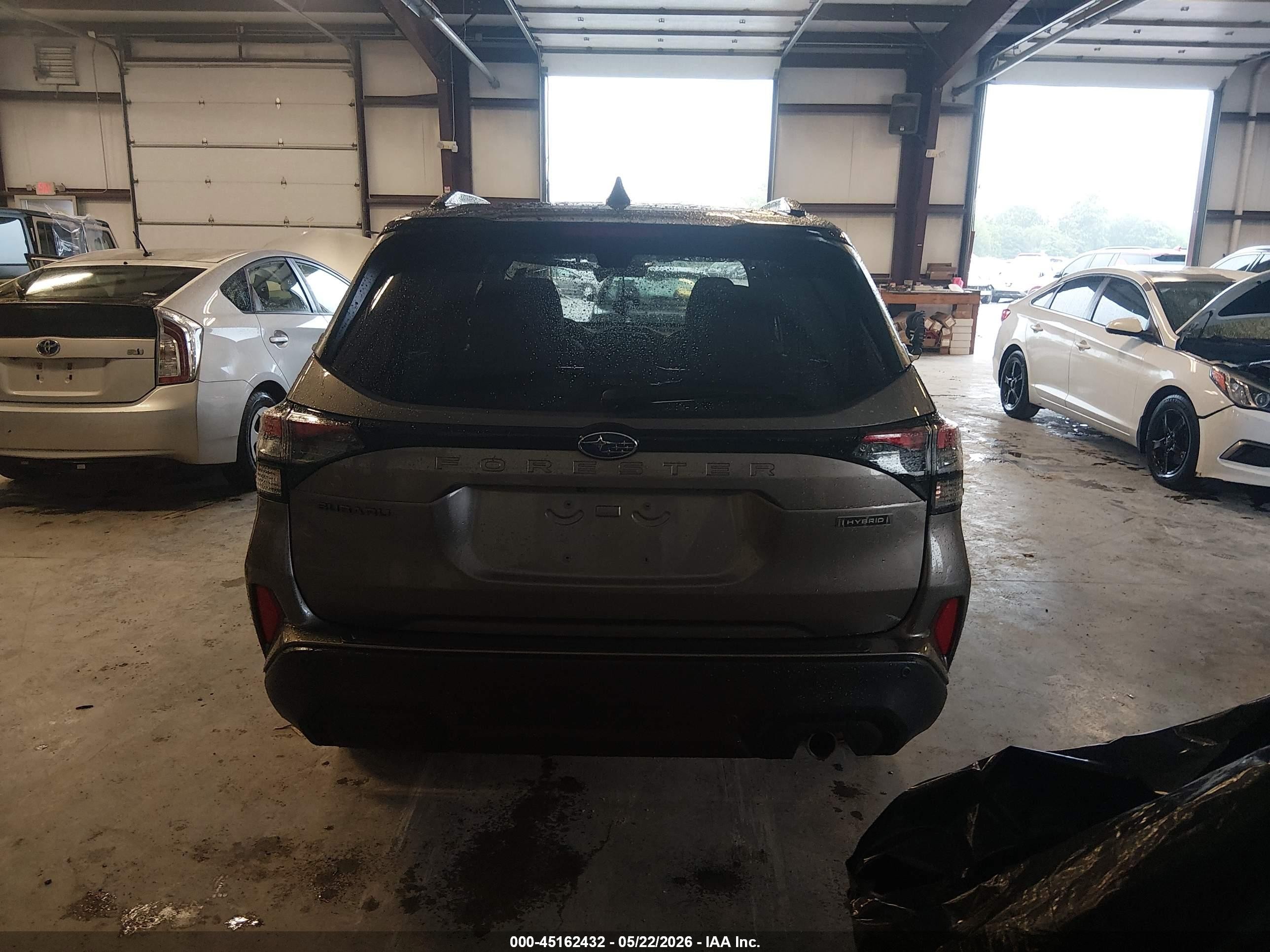 2025 Subaru Forester Touring Hybrid Tan vin: JF2SLSTD3SH421792