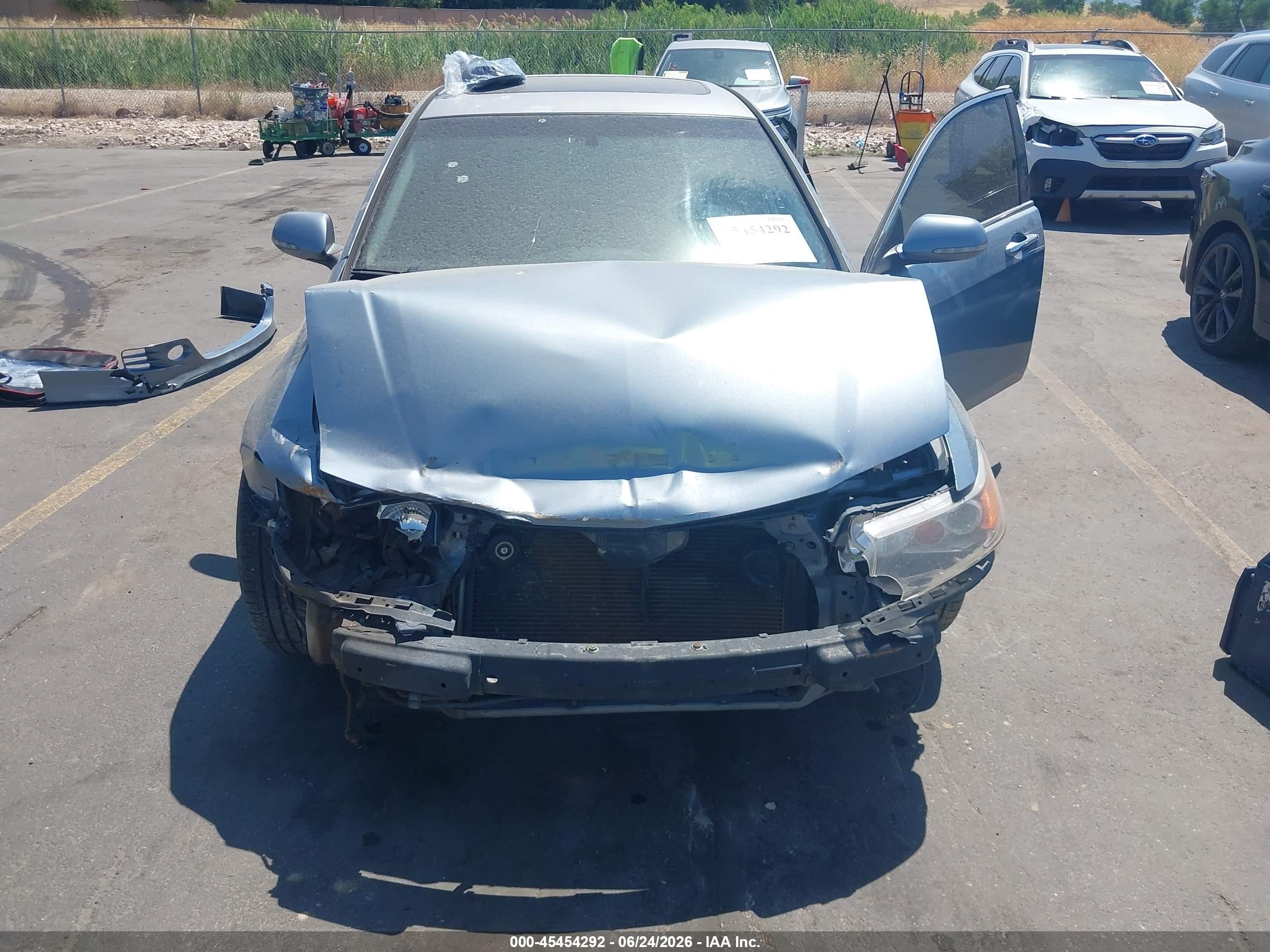 2008 Acura Tsx   Blue vin: JH4CL95808C015243