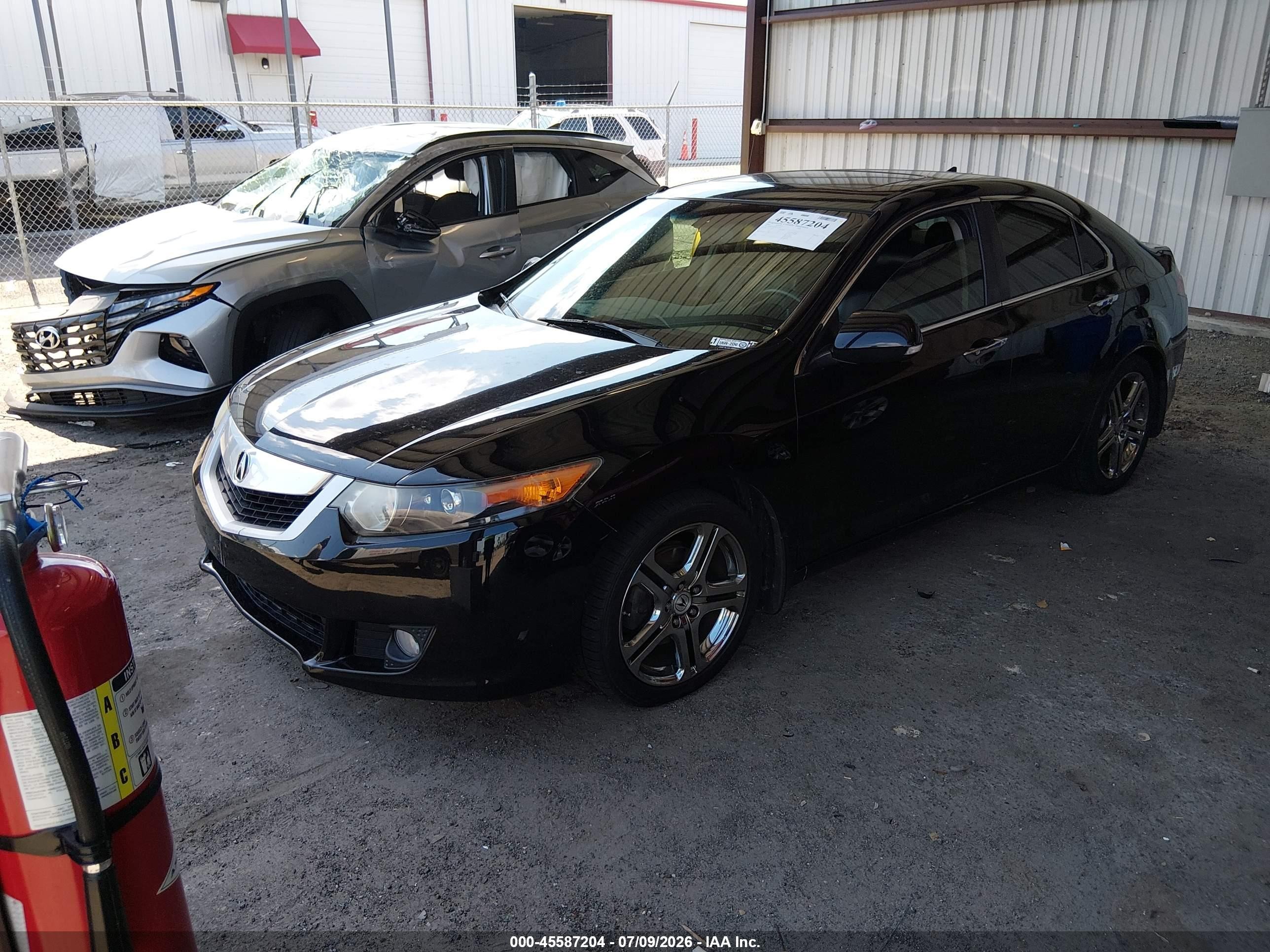 2009 Acura Tsx   Black vin: JH4CU26669C027559