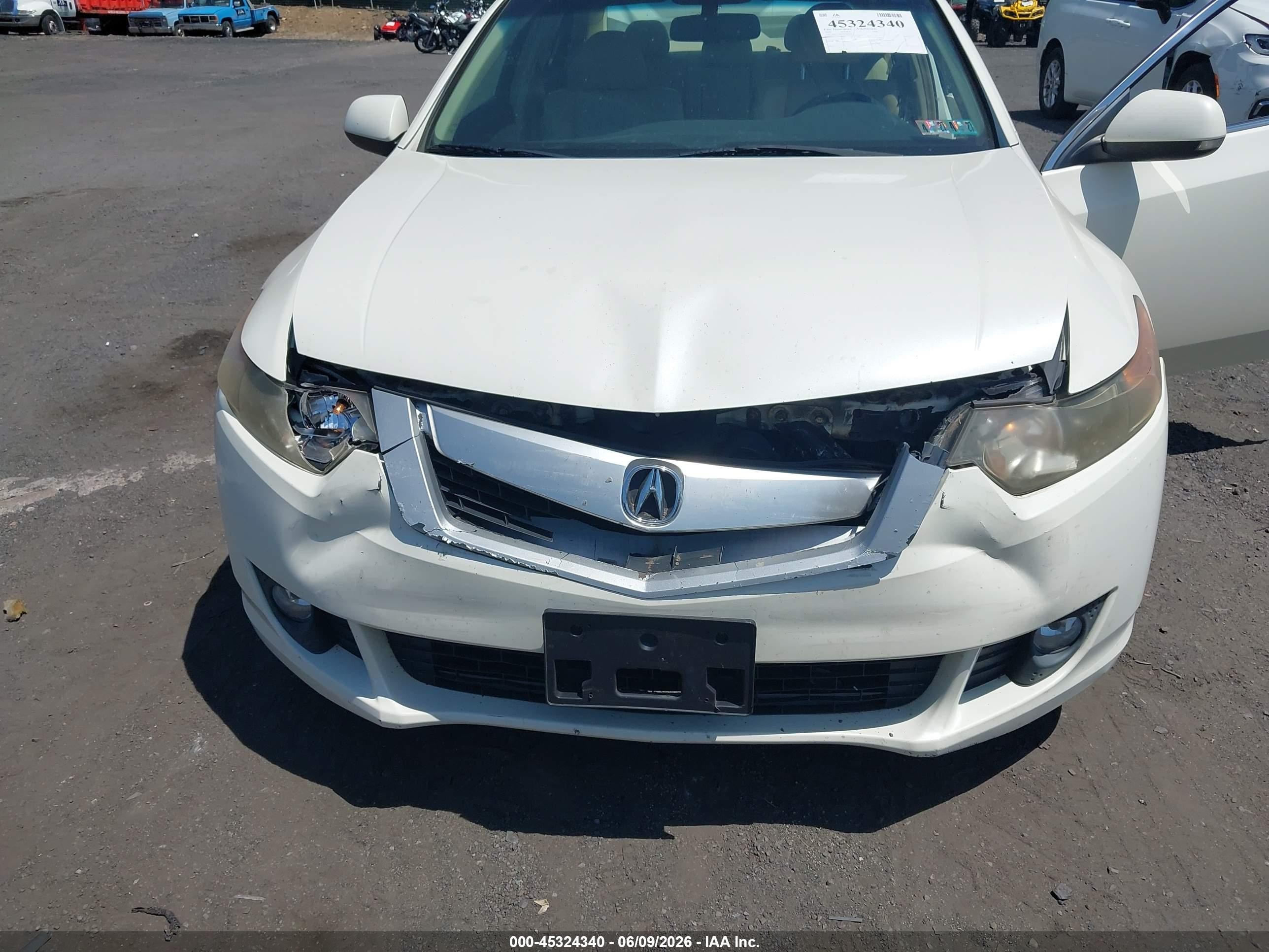 2009 Acura Tsx   White vin: JH4CU266X9C009050