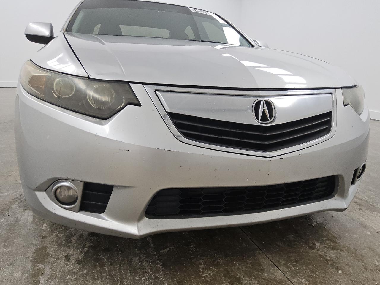 2013 Acura Tsx Tech Silver vin: JH4CU2F63DC006600 Damage: Front Bumper, Heavy Scratch, > 12 Inches