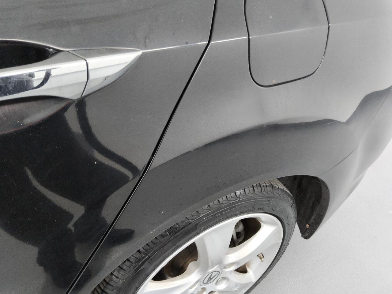 2010 Acura Tsx Black vin: JH4CU2F69AC000506 Damage: Left Qtr Panel, Dent(S) W/No Paint Dmg, 1/2 To 1 Inch