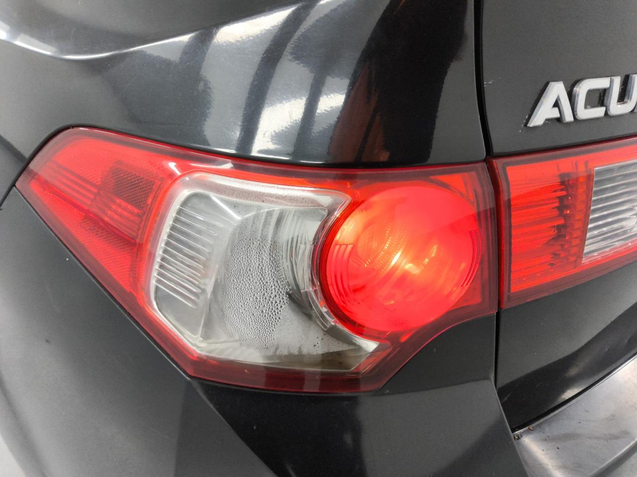 2010 Acura Tsx Black vin: JH4CU2F69AC000506 Damage: Left Tail Light, Water Damage, Replacement Required