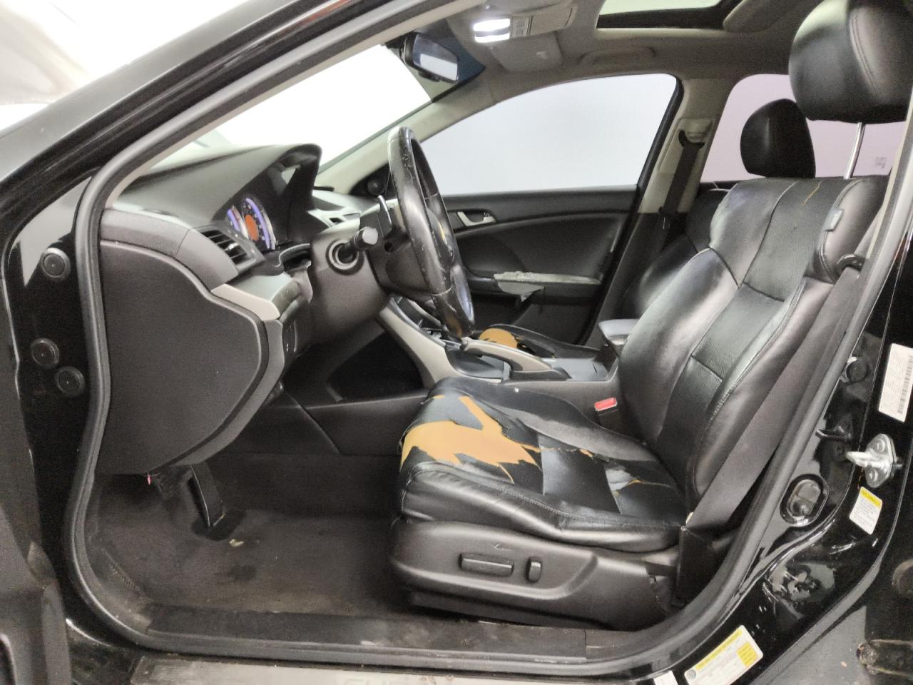 2010 Acura Tsx Black vin: JH4CU2F69AC000506 Damage: Left Front Seat, Torn, > 12 Inches