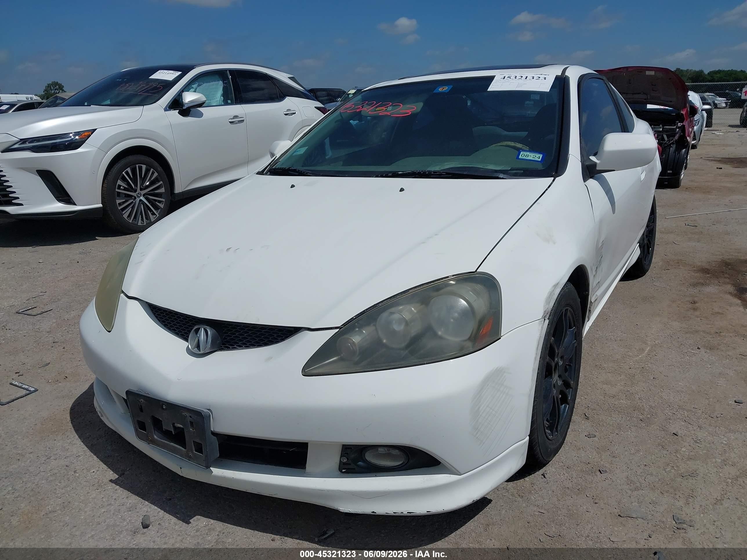 2006 Acura Rsx   White vin: JH4DC54876S009117