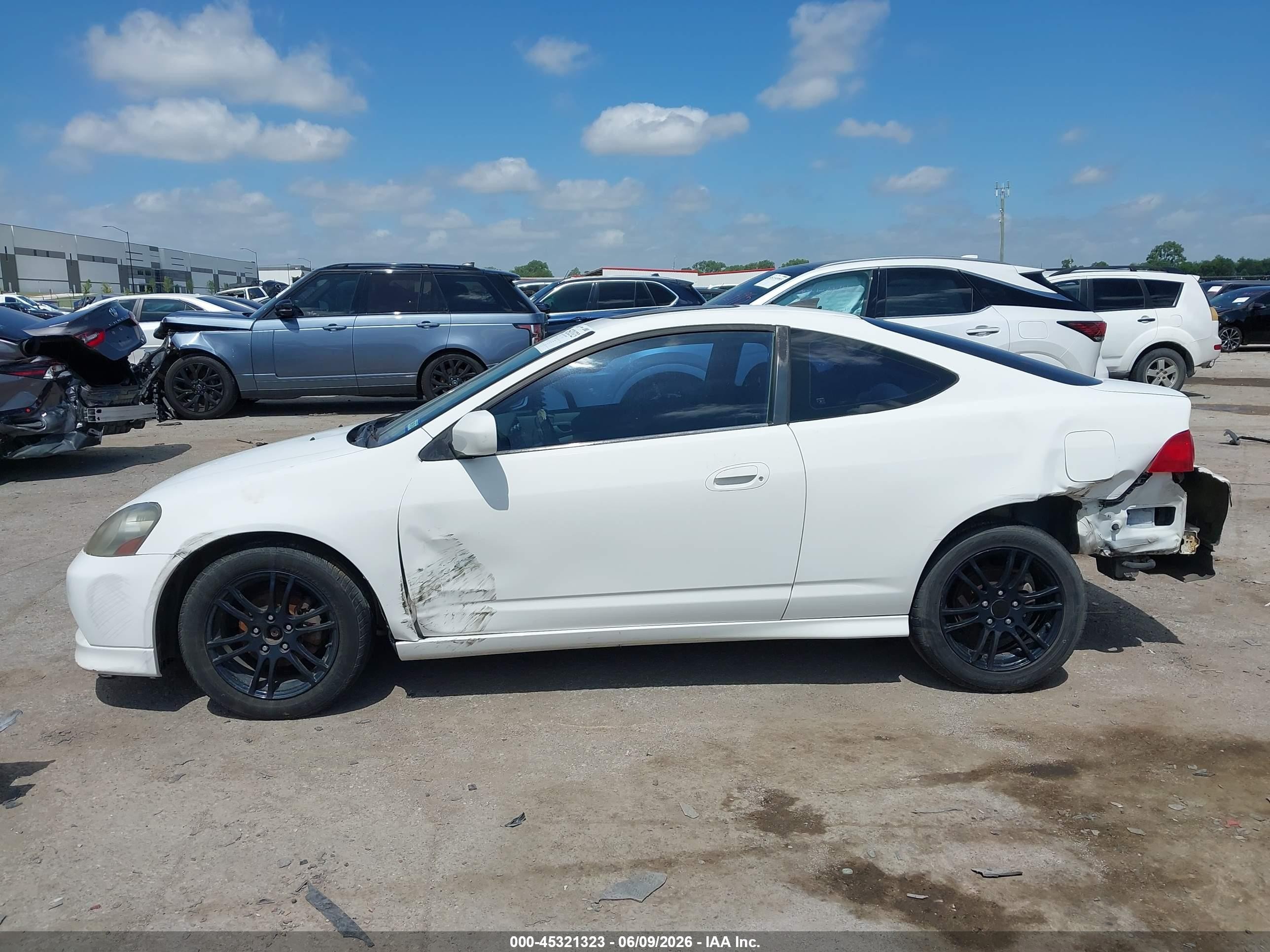 2006 Acura Rsx   White vin: JH4DC54876S009117