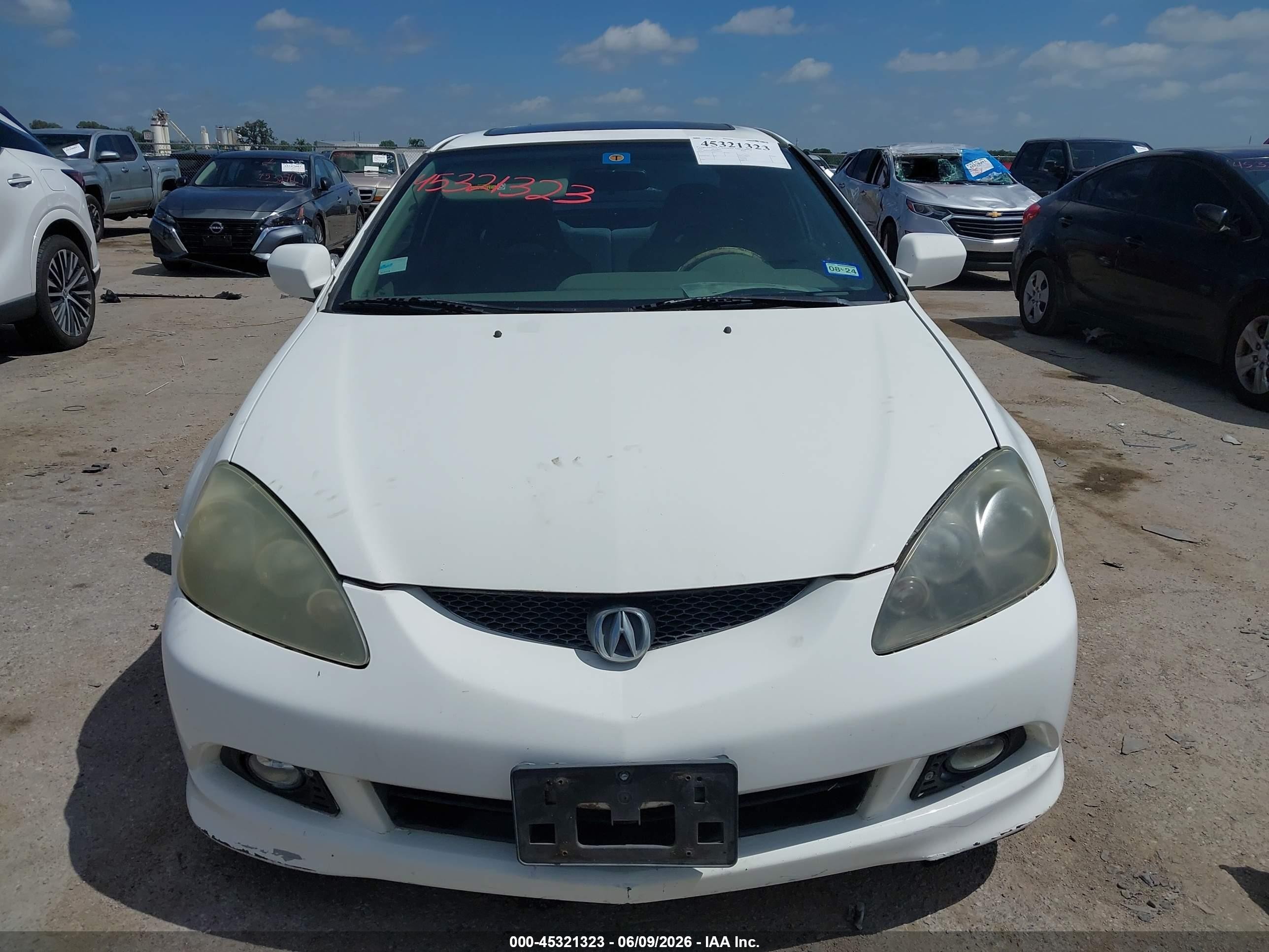 2006 Acura Rsx   White vin: JH4DC54876S009117
