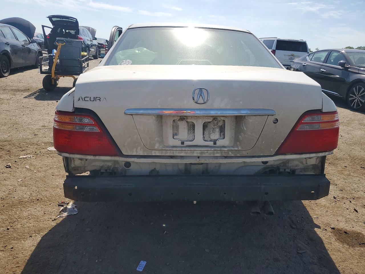 1999 Acura 3.5rl White vin: JH4KA9652XC005639