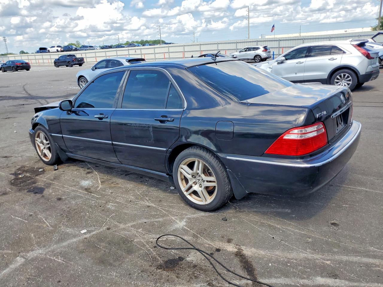 2002 Acura 3.5rl Black vin: JH4KA96532C013287