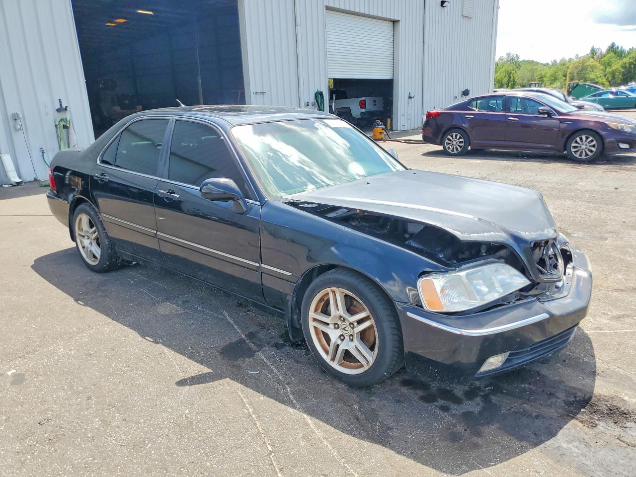 2002 Acura 3.5rl Black vin: JH4KA96532C013287