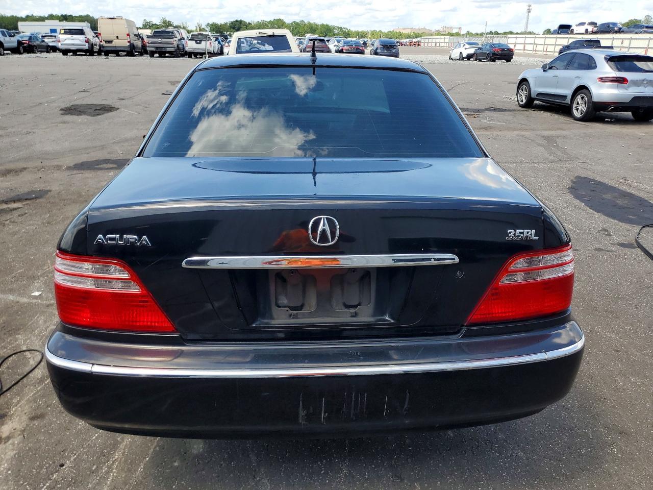 2002 Acura 3.5rl Black vin: JH4KA96532C013287