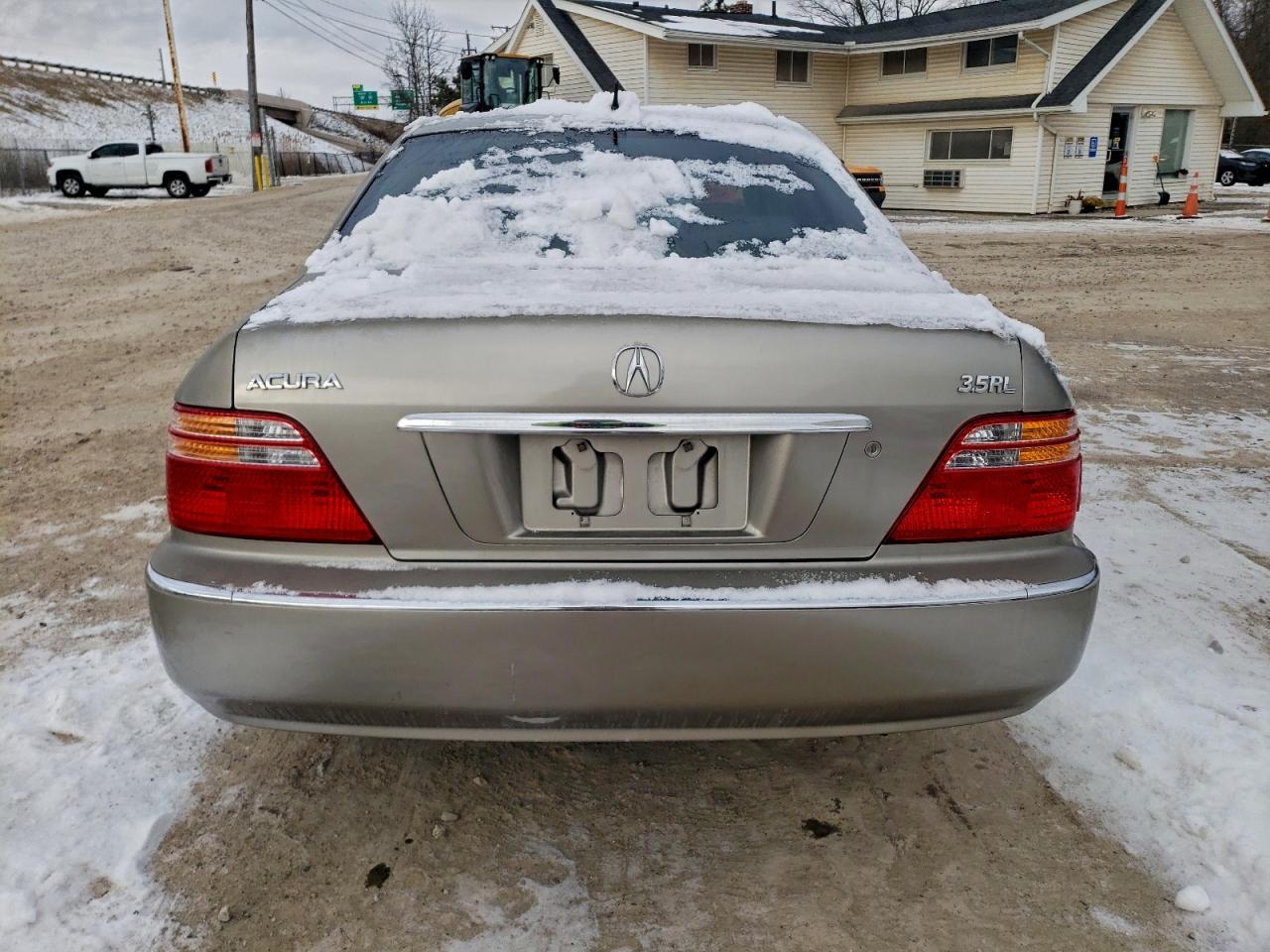 2002 Acura 3.5rl Gold vin: JH4KA965X2C001475