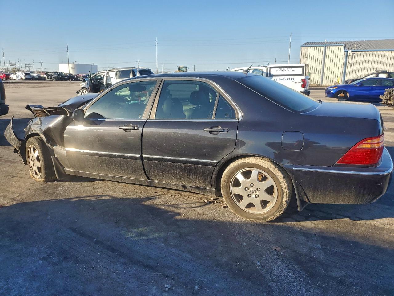 2002 Acura 3.5rl Black vin: JH4KA96682C003833