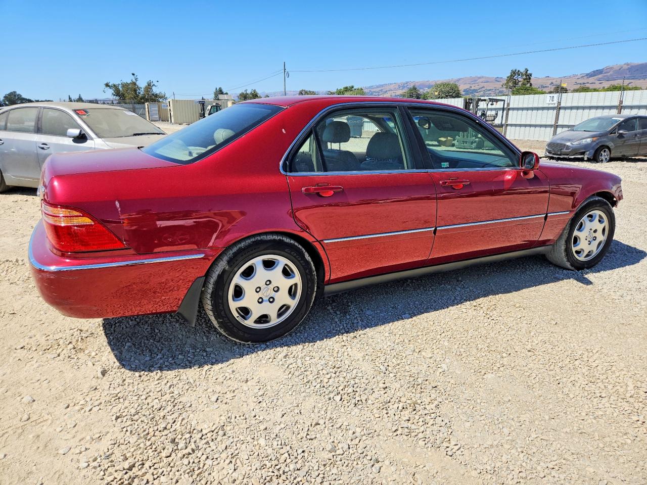 2000 Acura 3.5rl Burgundy vin: JH4KA9668YC013514