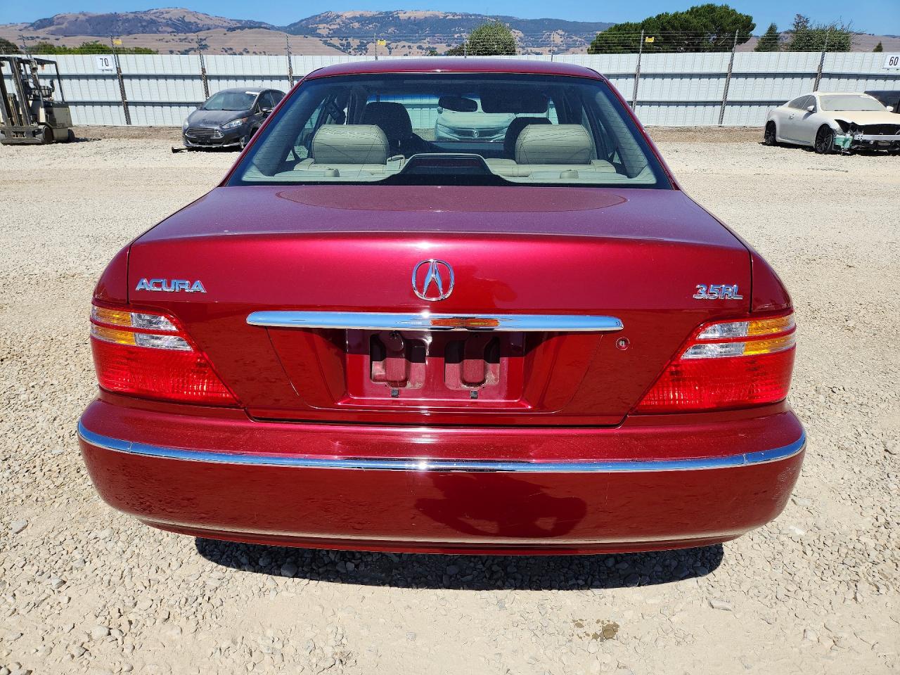 2000 Acura 3.5rl Burgundy vin: JH4KA9668YC013514