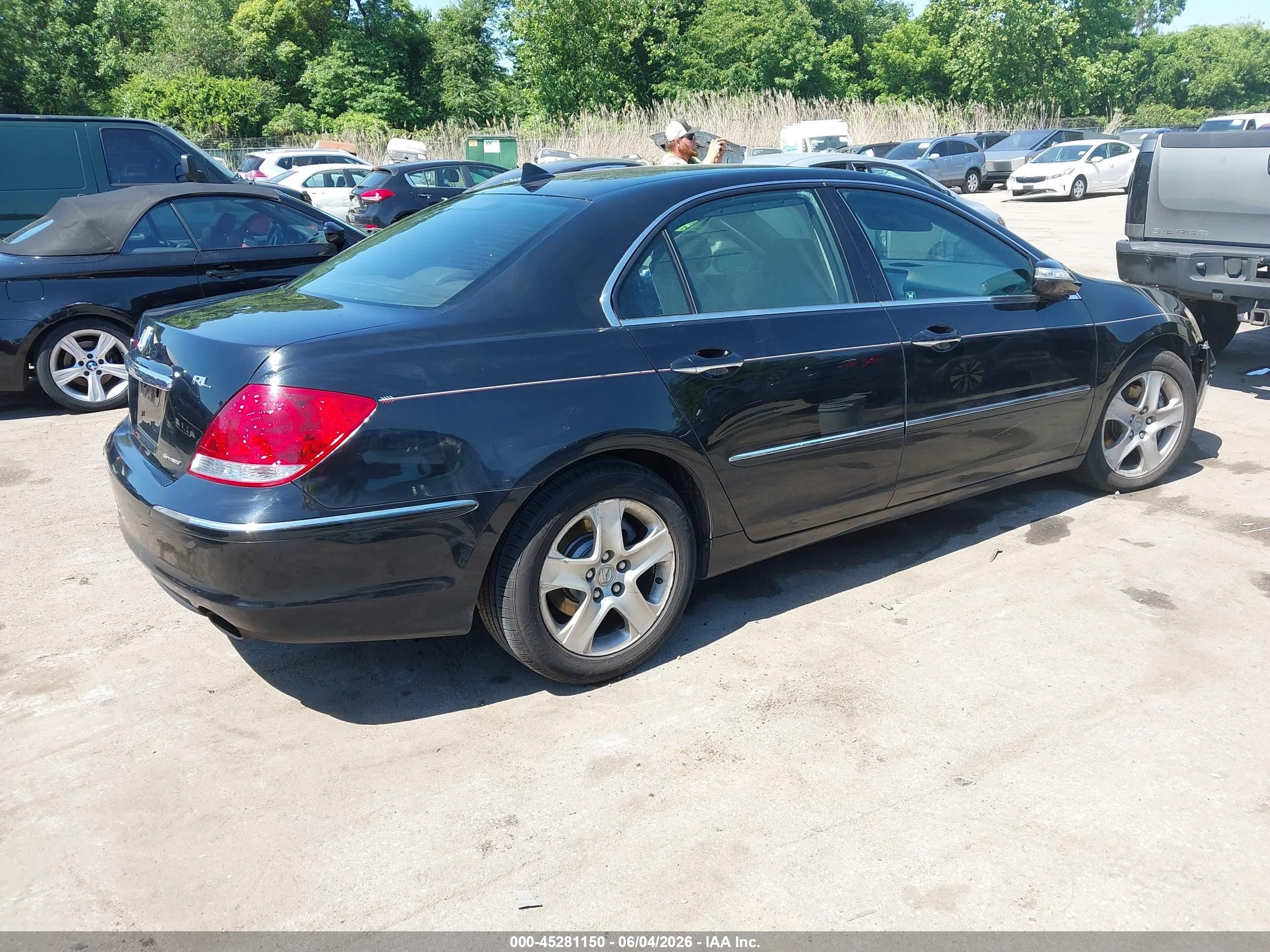 2005 Acura Rl 3.5 Black vin: JH4KB16575C006894