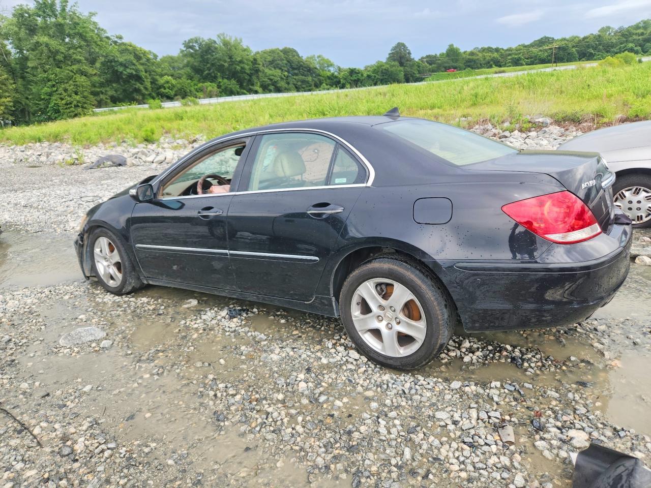 2005 Acura Rl Black vin: JH4KB16575C009276