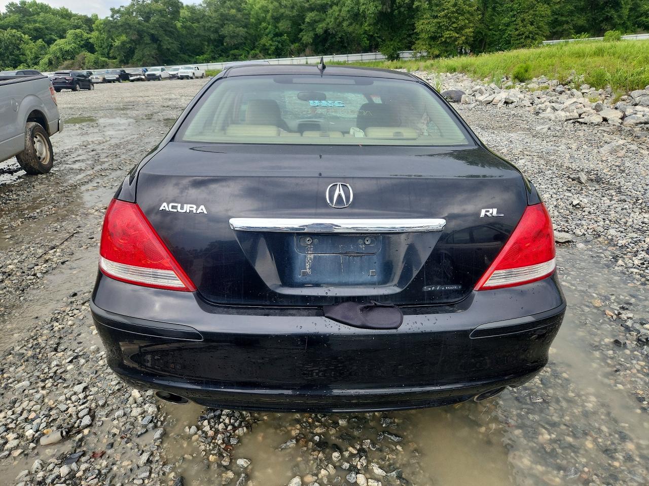 2005 Acura Rl Black vin: JH4KB16575C009276