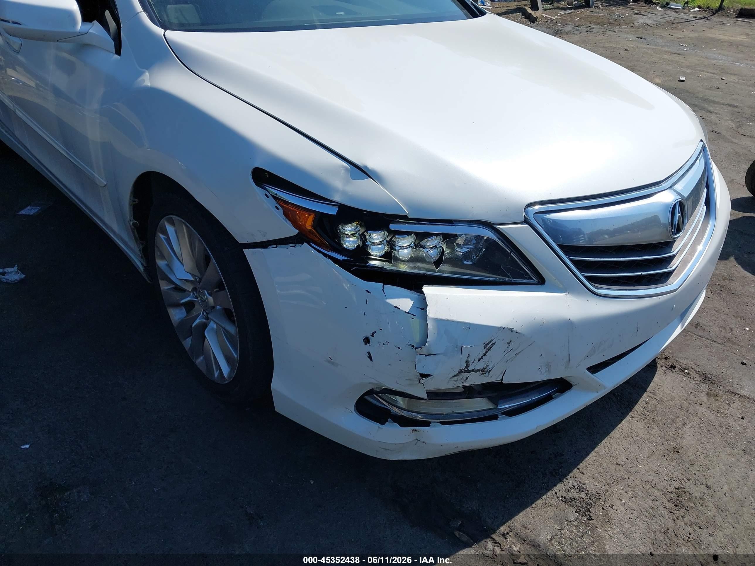2014 Acura Rlx   White vin: JH4KC1F35EC002404