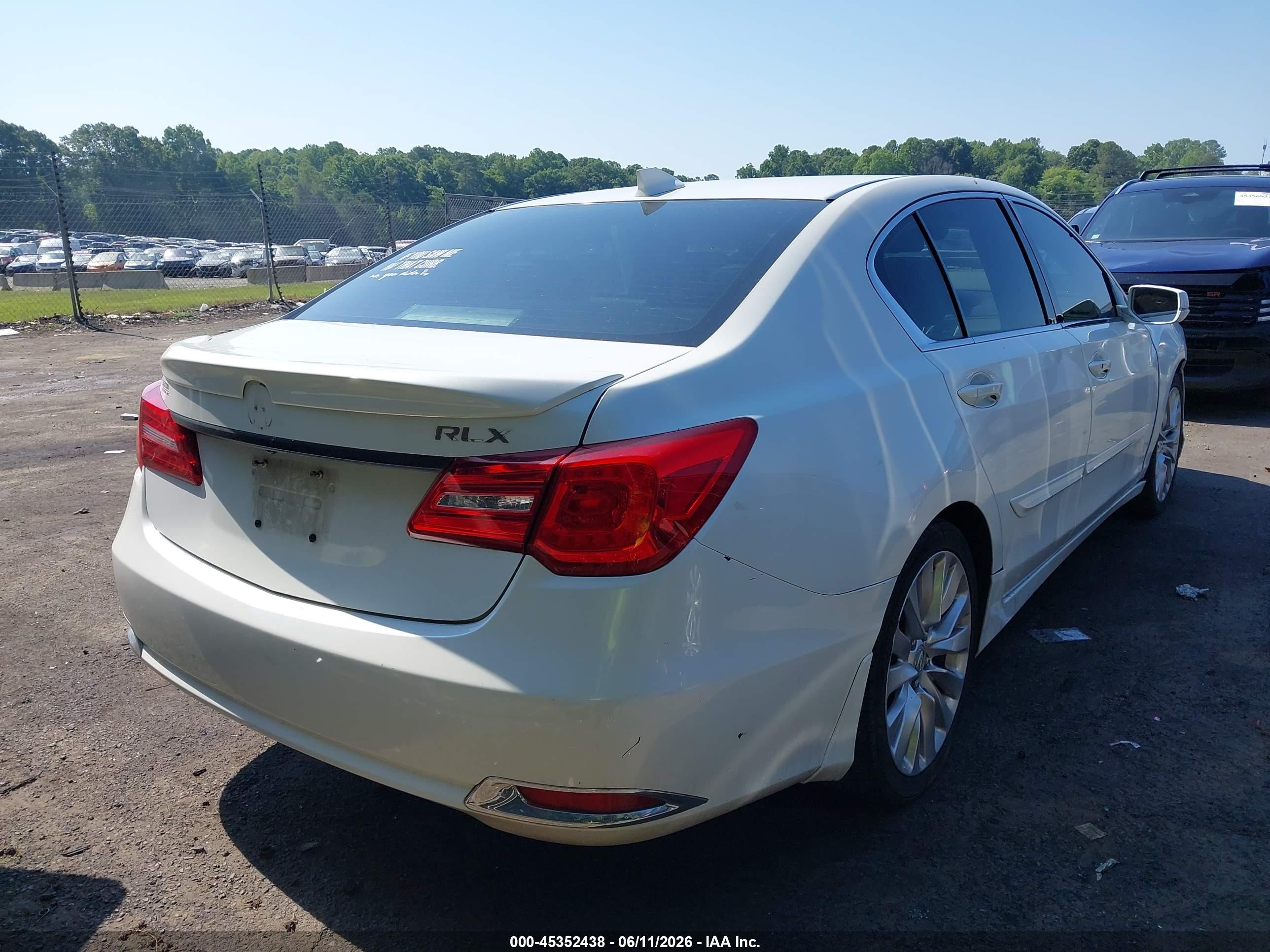 2014 Acura Rlx   White vin: JH4KC1F35EC002404