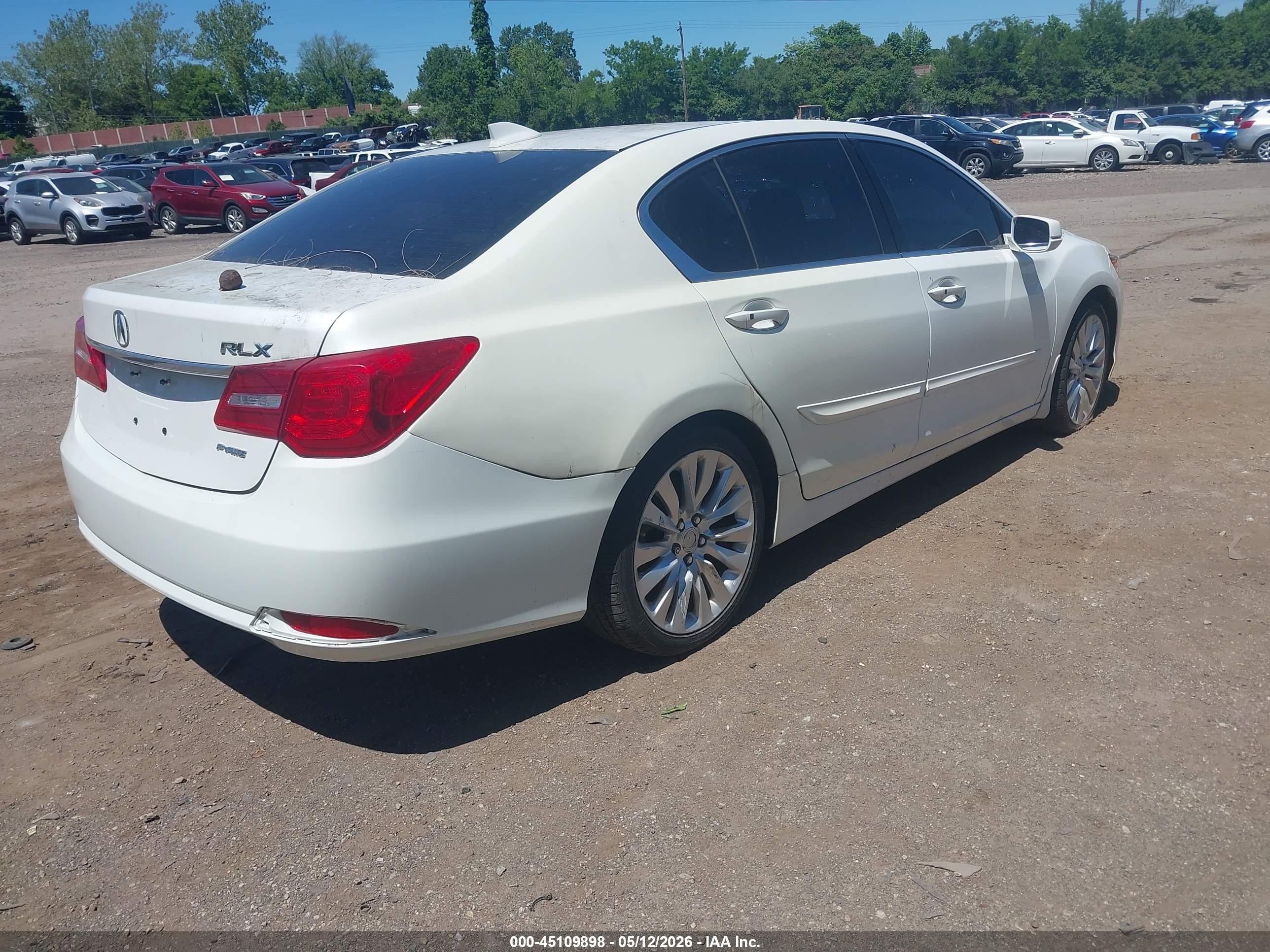 2014 Acura Rlx   White vin: JH4KC1F54EC001441
