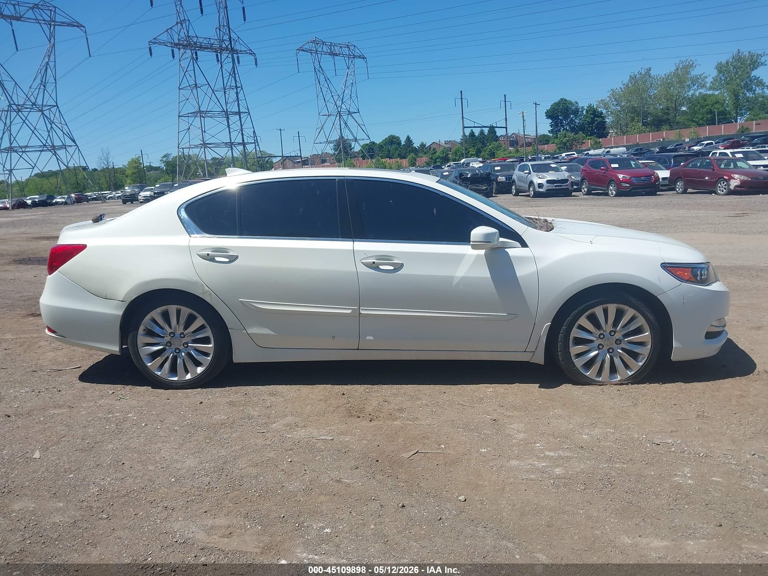 2014 Acura Rlx   White vin: JH4KC1F54EC001441