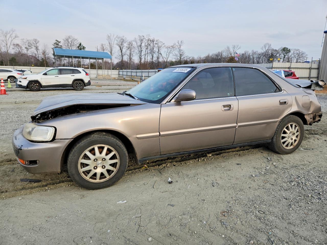 1997 Acura 2.5tl Tan vin: JH4UA2653VC002746
