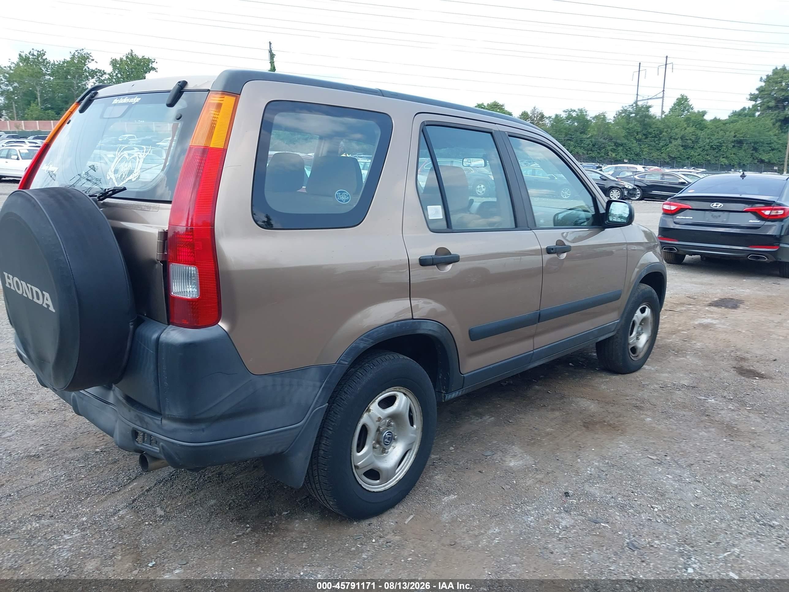 2002 Honda Cr-v Lx Dark Brown vin: JHLRD78452C059500