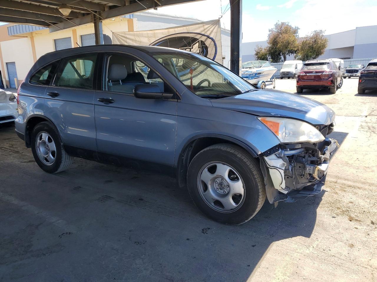 2010 Honda Cr-v Lx Blue vin: JHLRE3H30AC008577