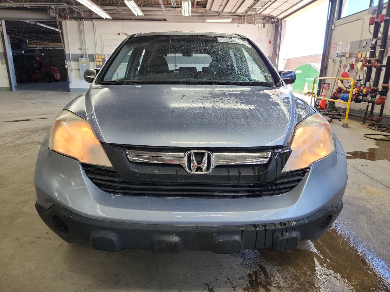 2007 Honda Cr-v Ex Blue vin: JHLRE48557C038643 Damage: Left Head Lamp, Faded, Repair Required