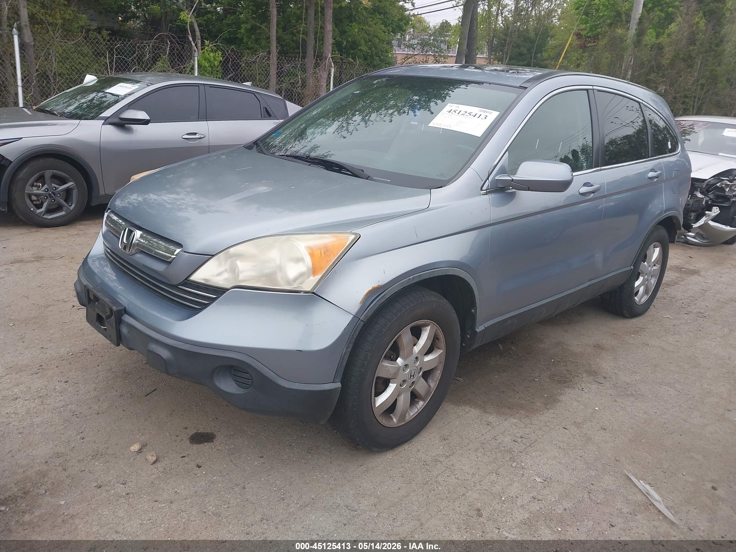 2009 Honda Cr-v Ex-l Blue vin: JHLRE48759C001547
