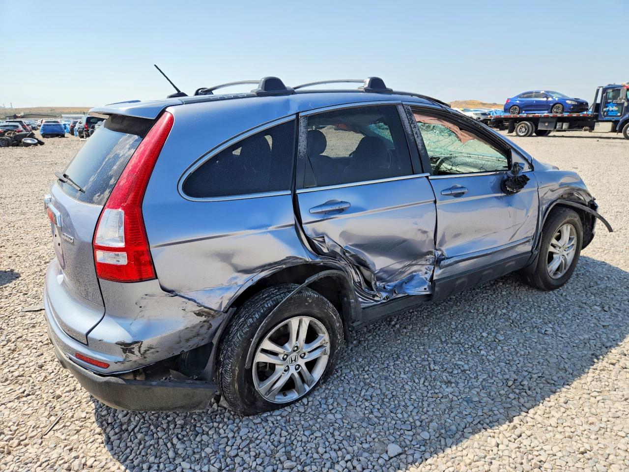 2010 Honda Cr-v Exl Blue vin: JHLRE4H76AC006020