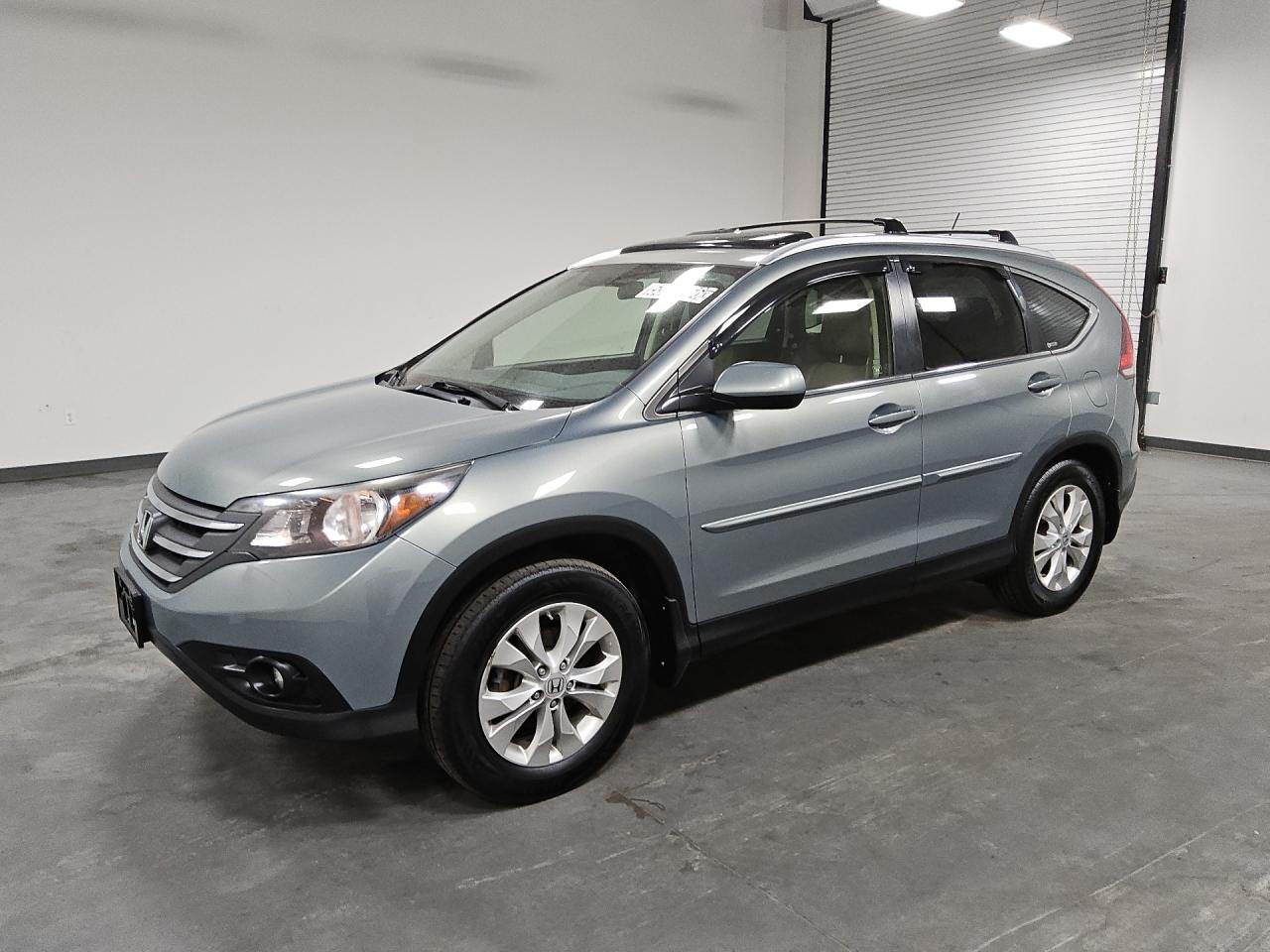 2012 Honda Cr-v Exl Green vin: JHLRM4H76CC006217 Damage: Left Front Tire, Worn, Replacement Required
