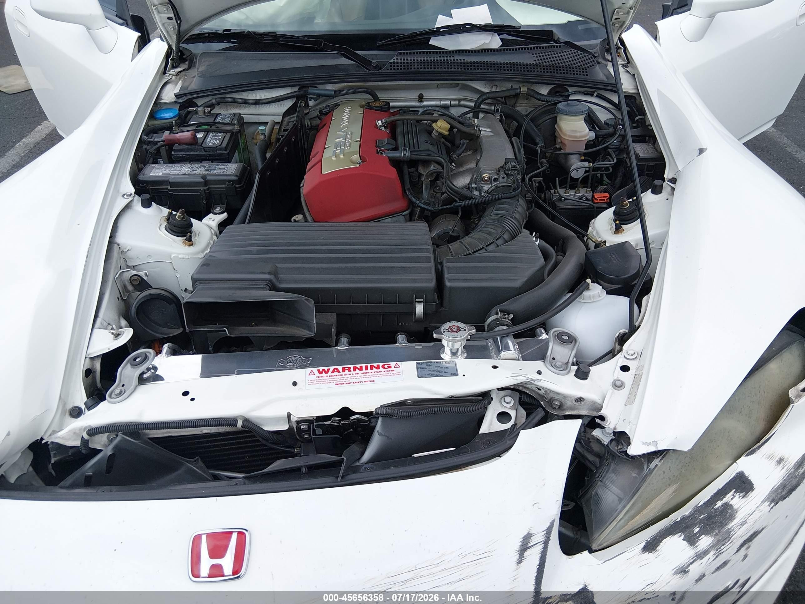 2005 Honda S2000   White vin: JHMAP21445S002440