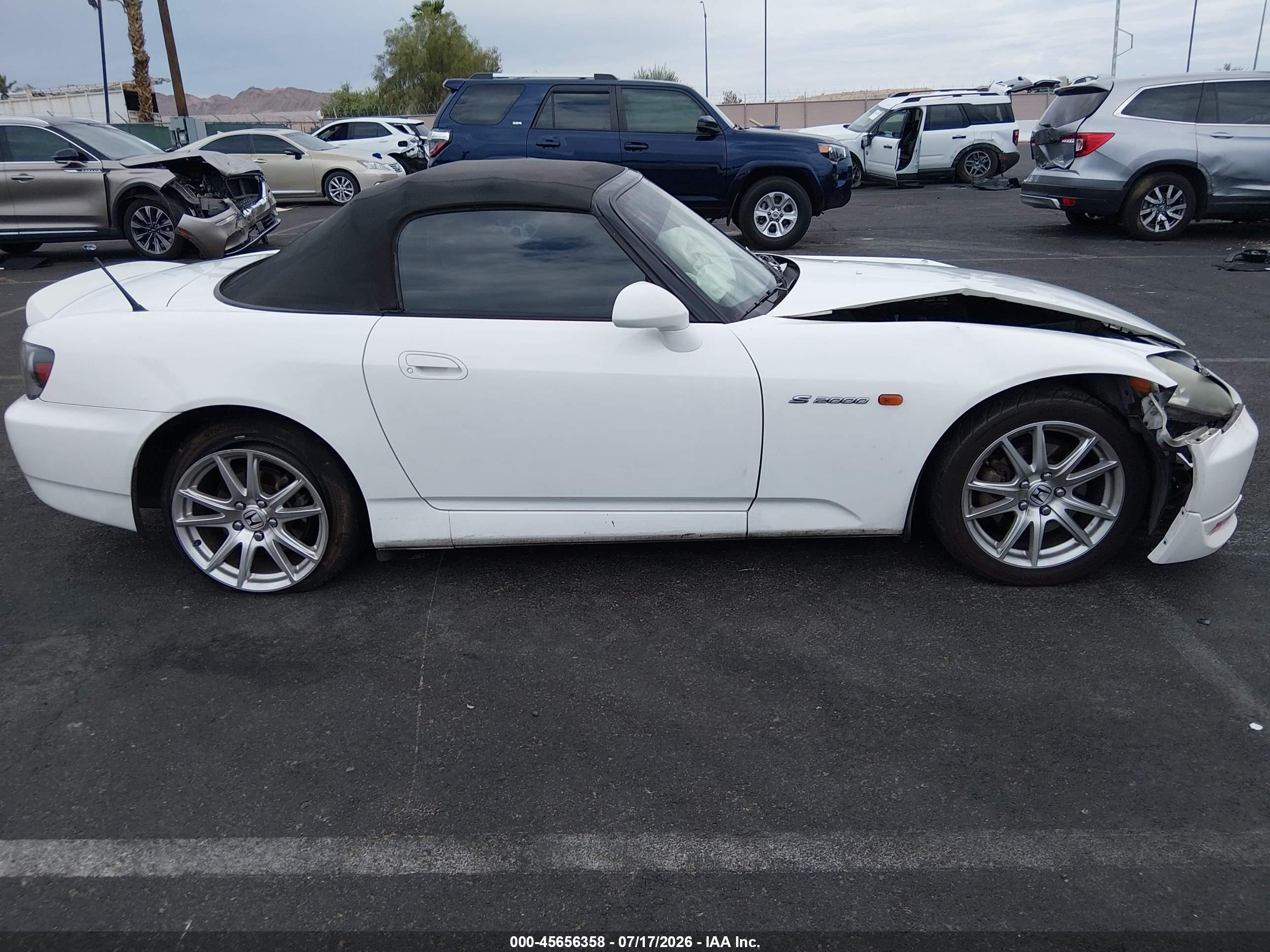2005 Honda S2000   White vin: JHMAP21445S002440