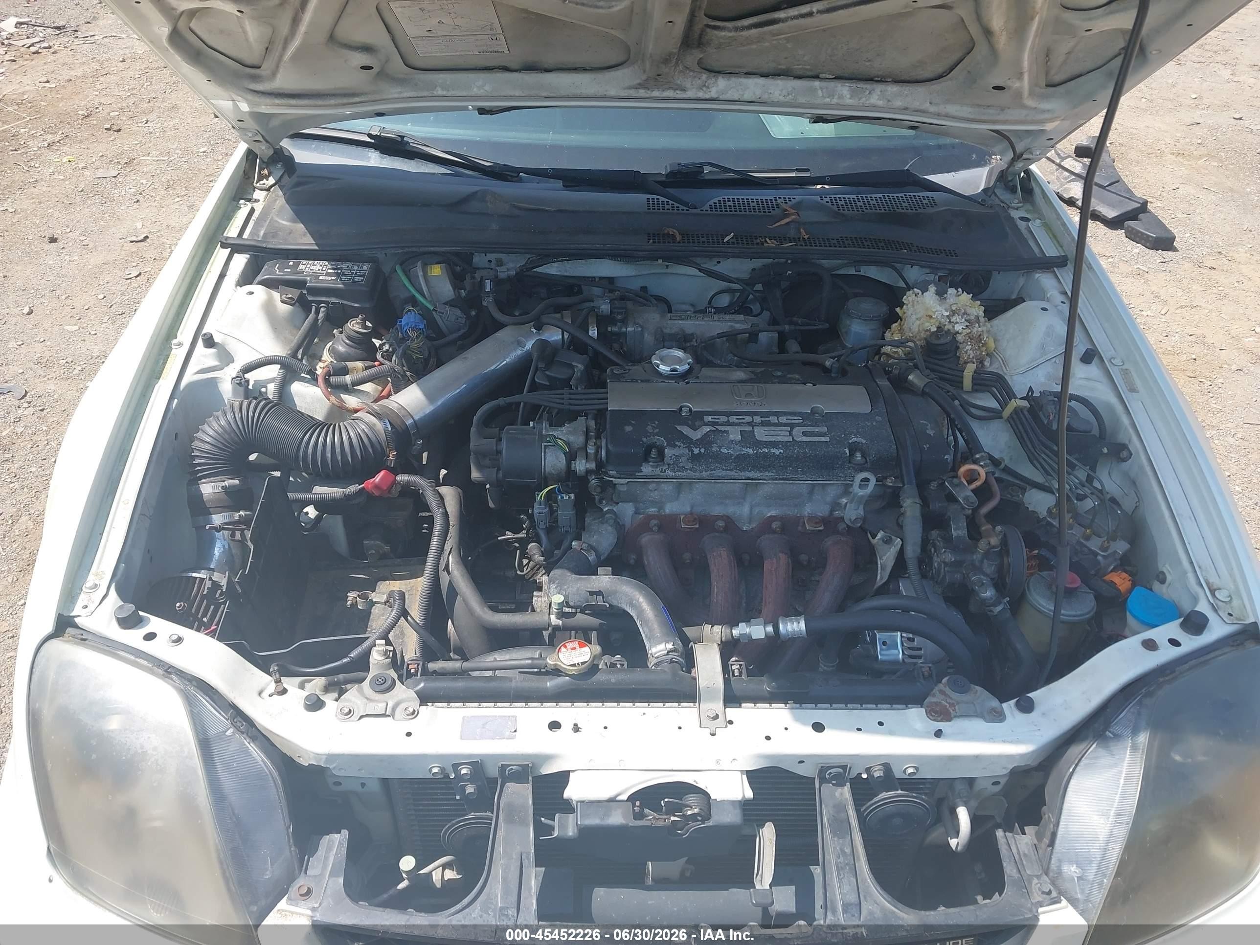 1998 Honda Prelude   White vin: JHMBB6145WC014523